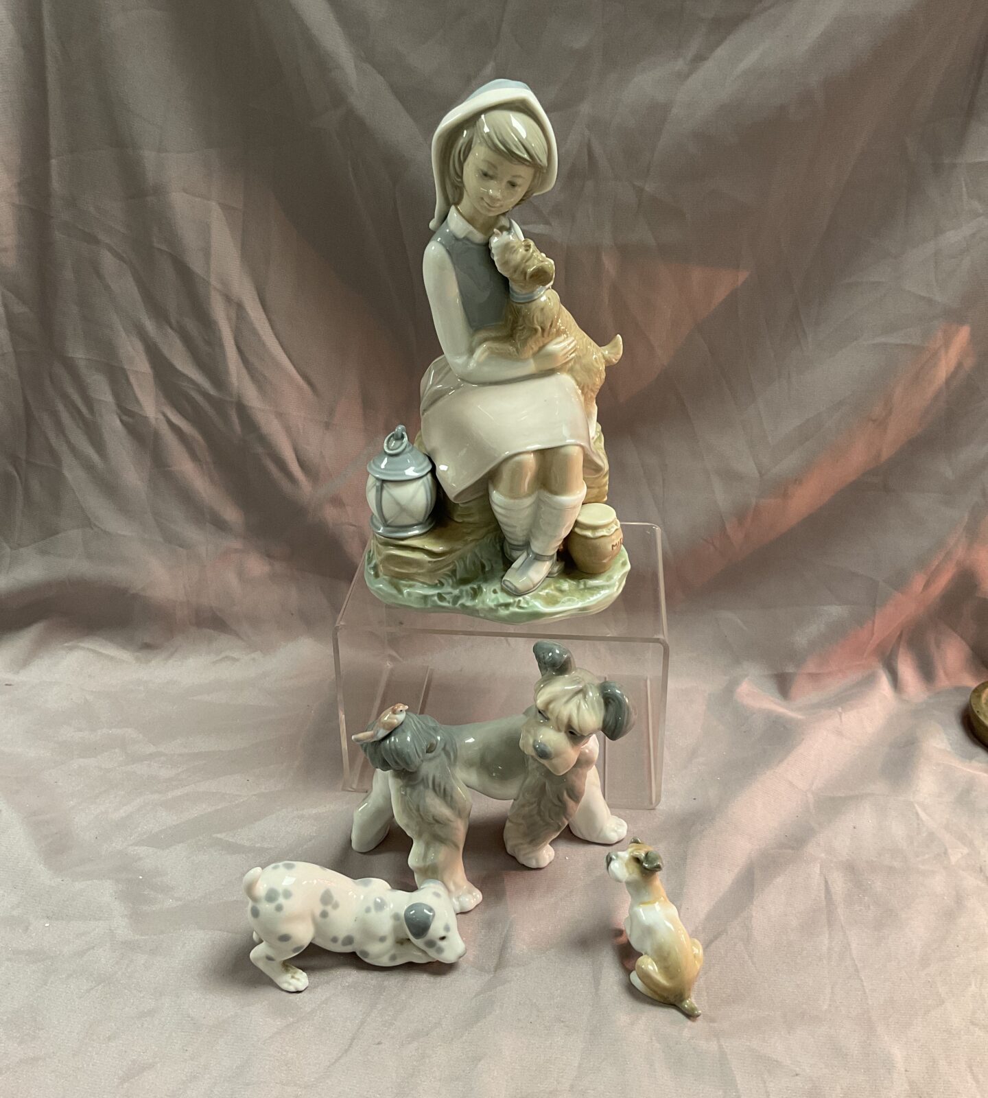 Lladro girl with dog and three dogs