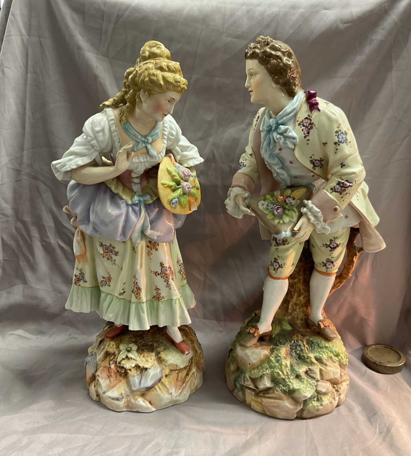 pair of 16” circa 1900 possibly Sitzendorf porcelain courtship figures a gallant and his maiden in 18th c dress