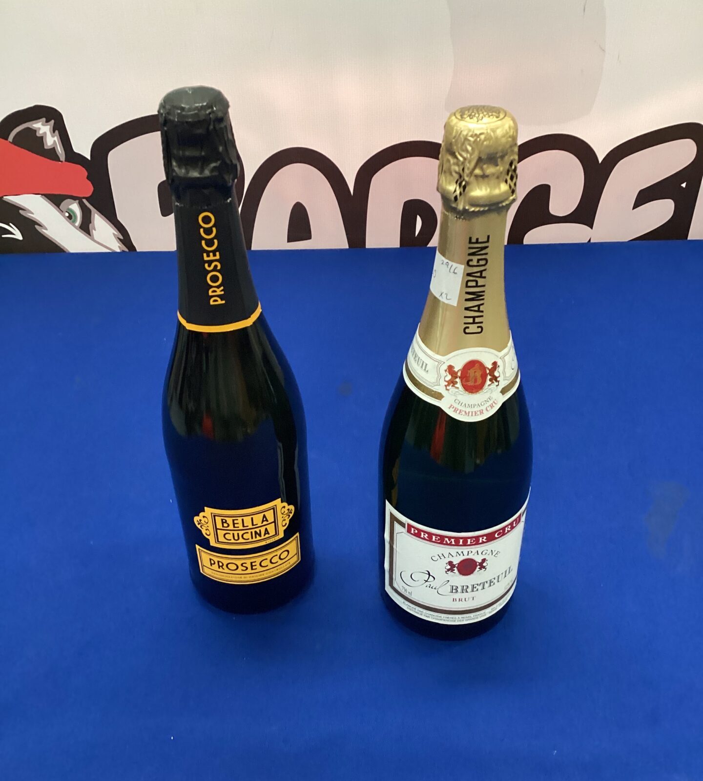 Bottle of bella cucina prosecco & paul breteuil brut champagne
