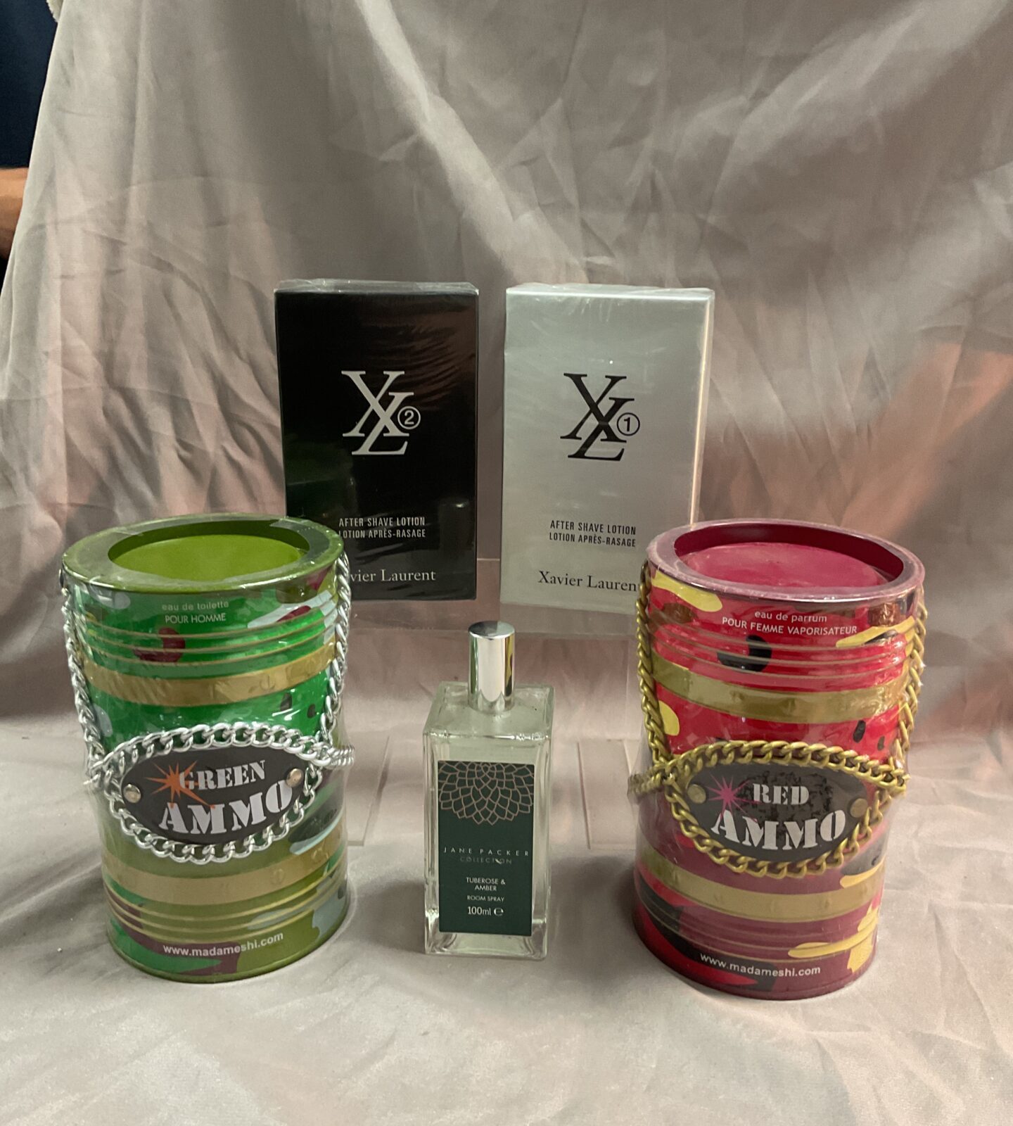 Two seale Xl aftershave Two sealed tins red and green ammo perfume and bottle Jane packer
