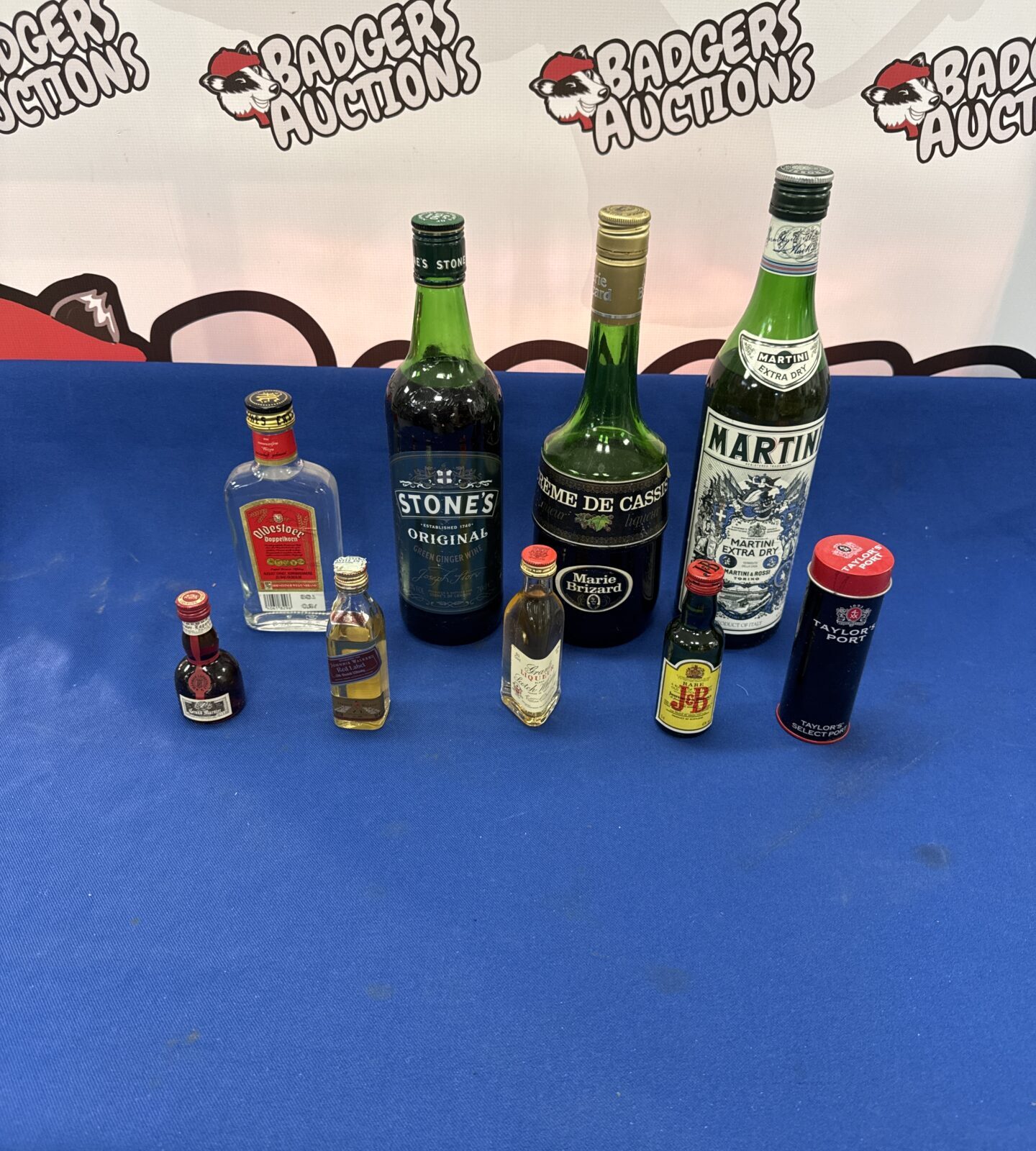 Selection of bottles of alcohol inc martini & others