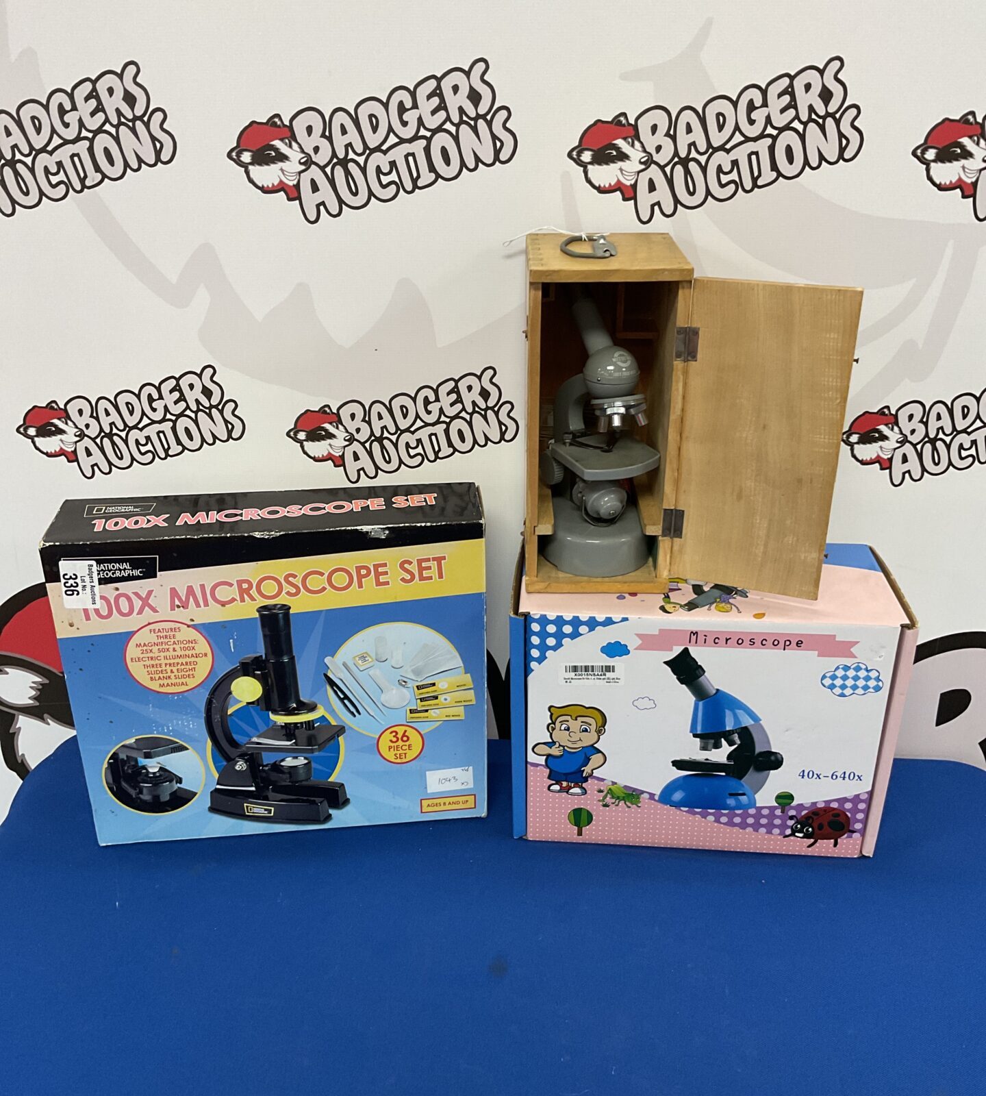 Three children's microscopes including vintage mitsuwa microscope
