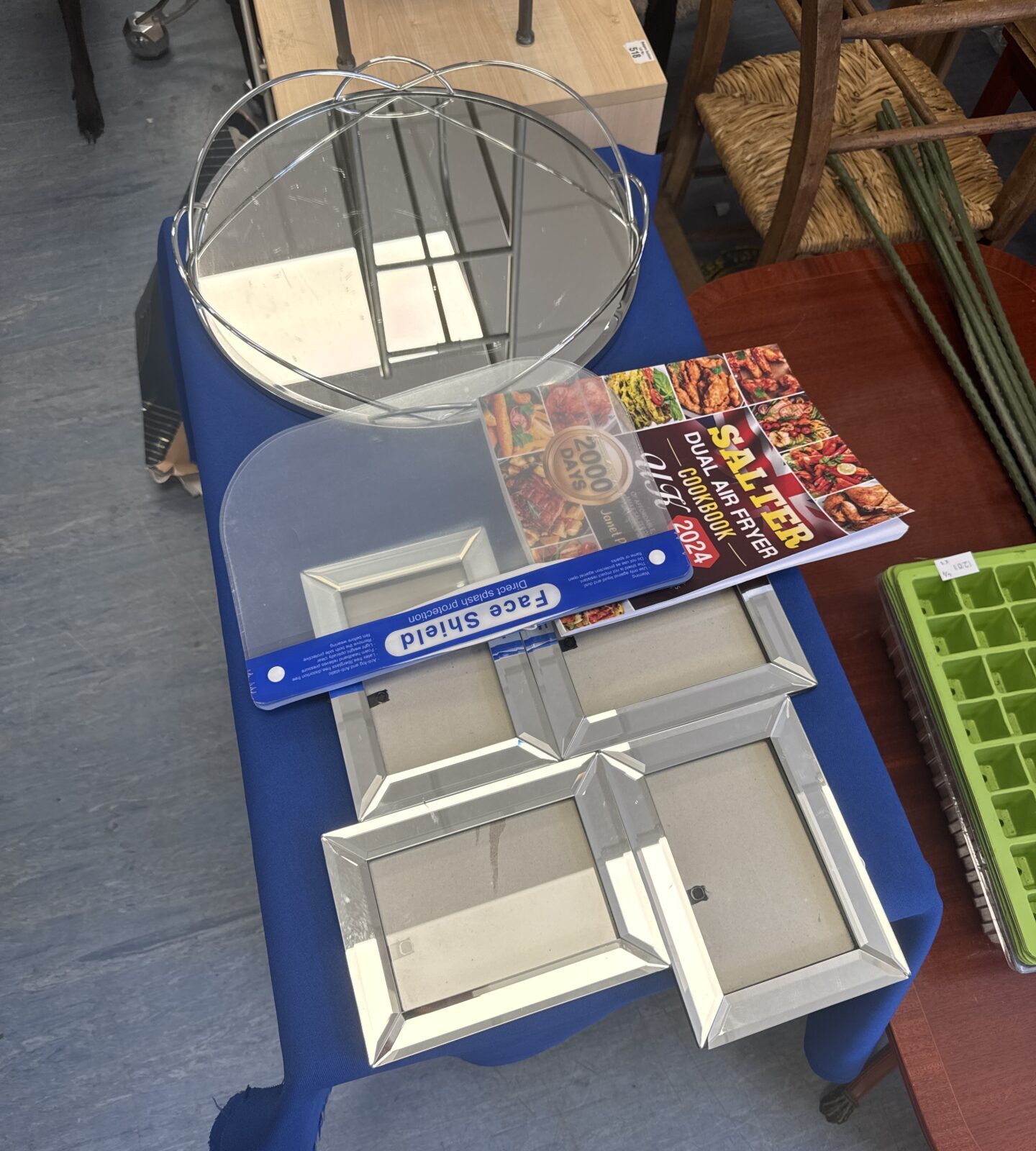 Selection of items inc mirrored serving tray, face masks, air fryer cookery book & photo frame