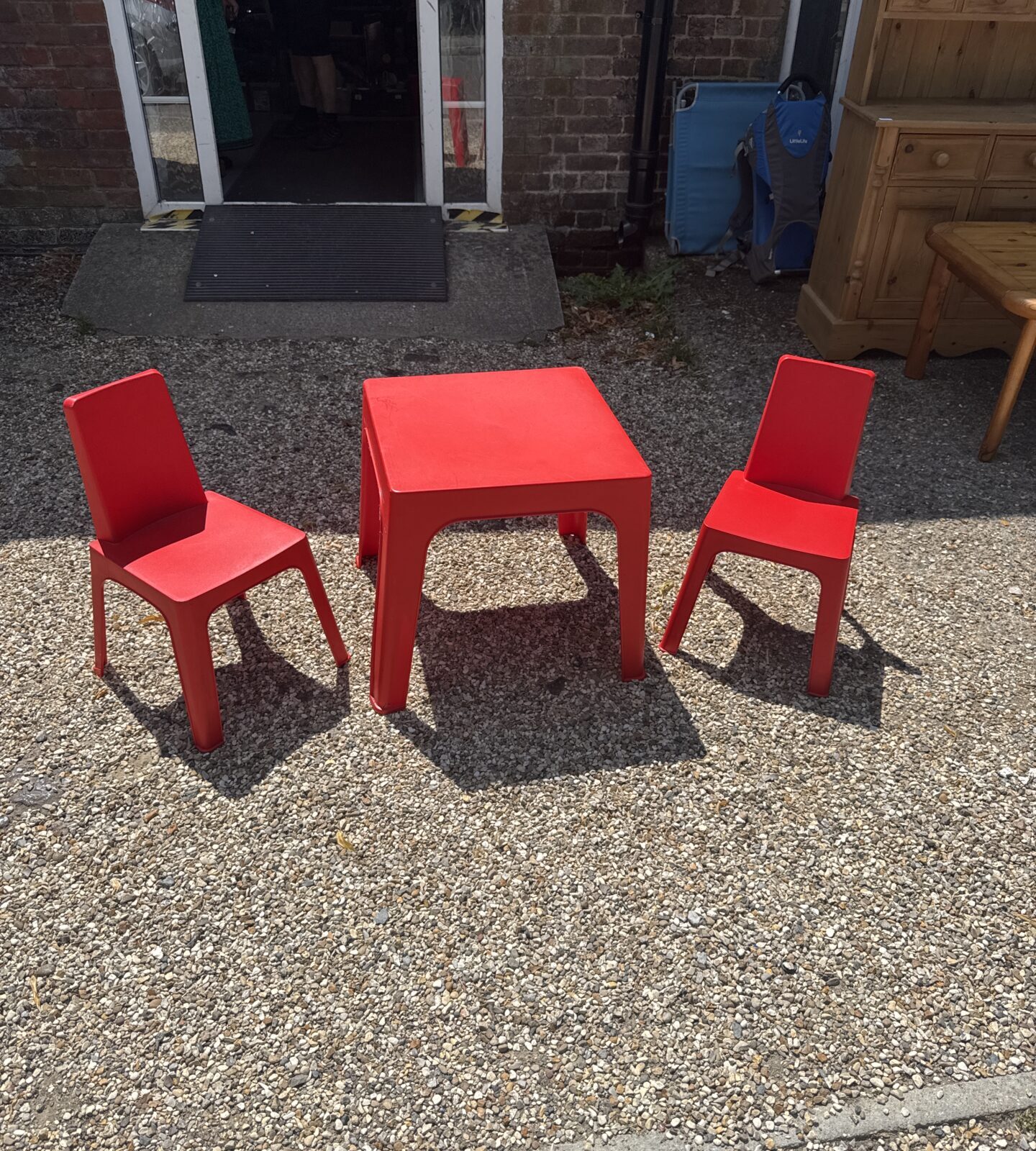 Children’s plastic table with two chairs