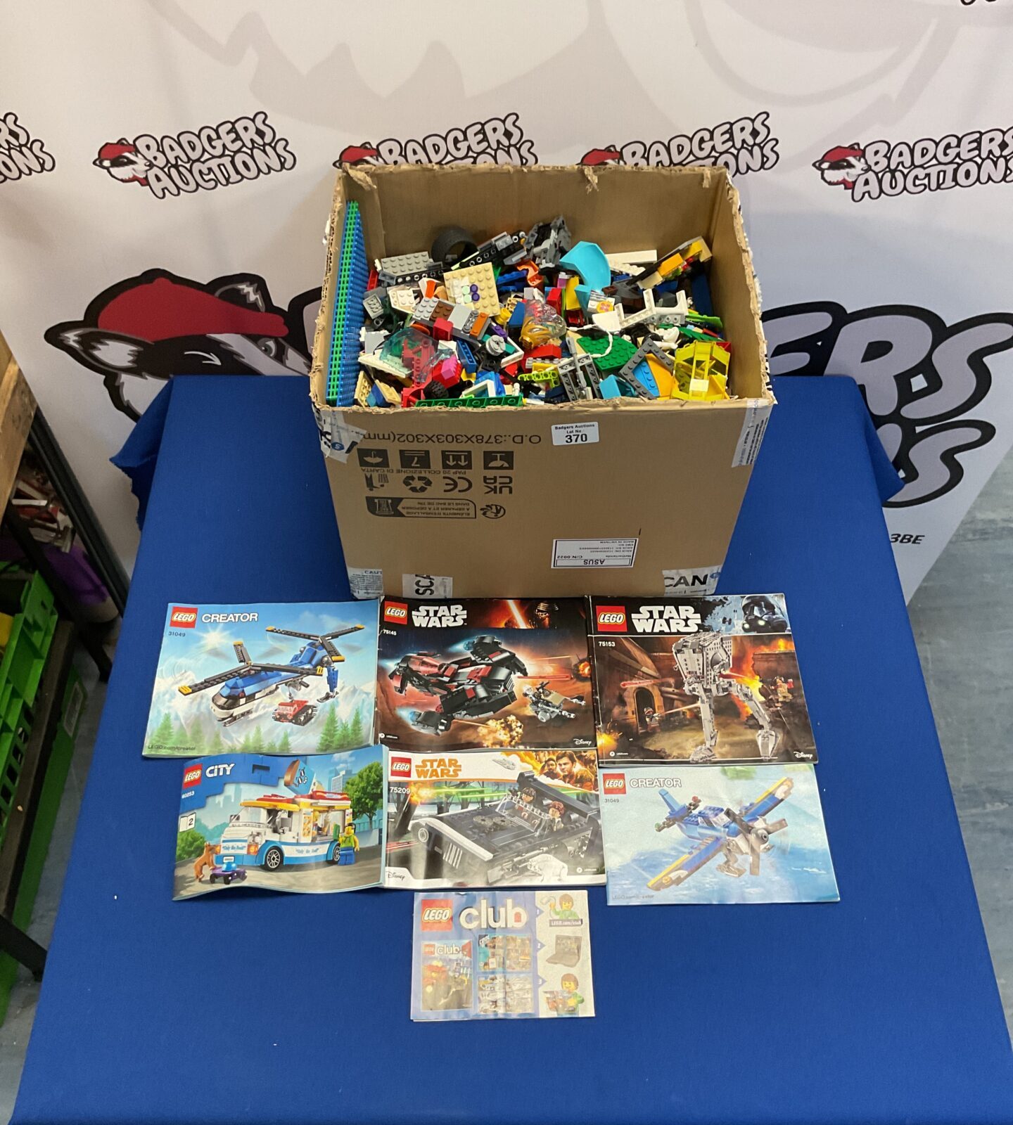 Large box of mixed Lego inc manuals