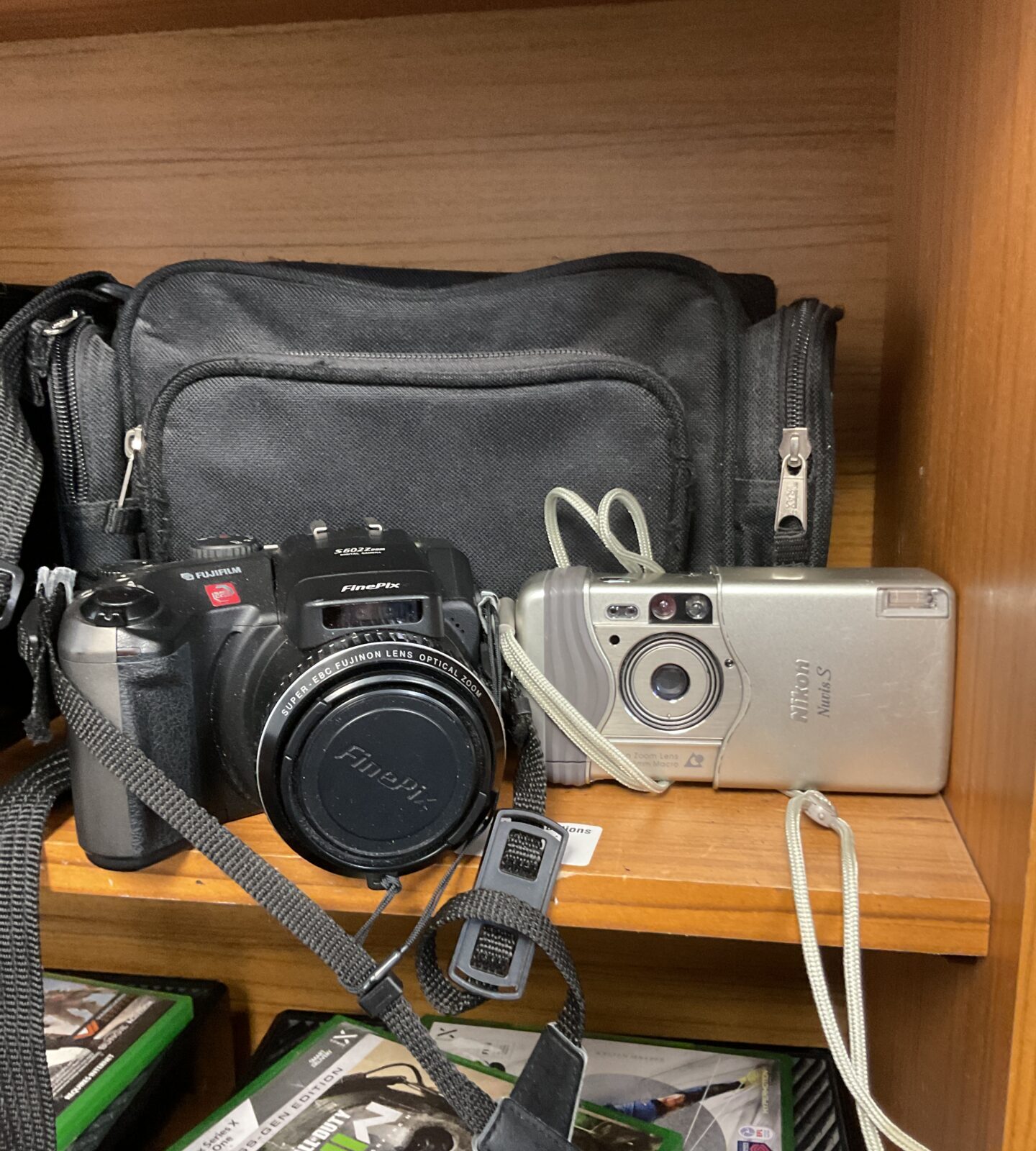 Fujifilm finepix s602z & nikon nuvis s cameras