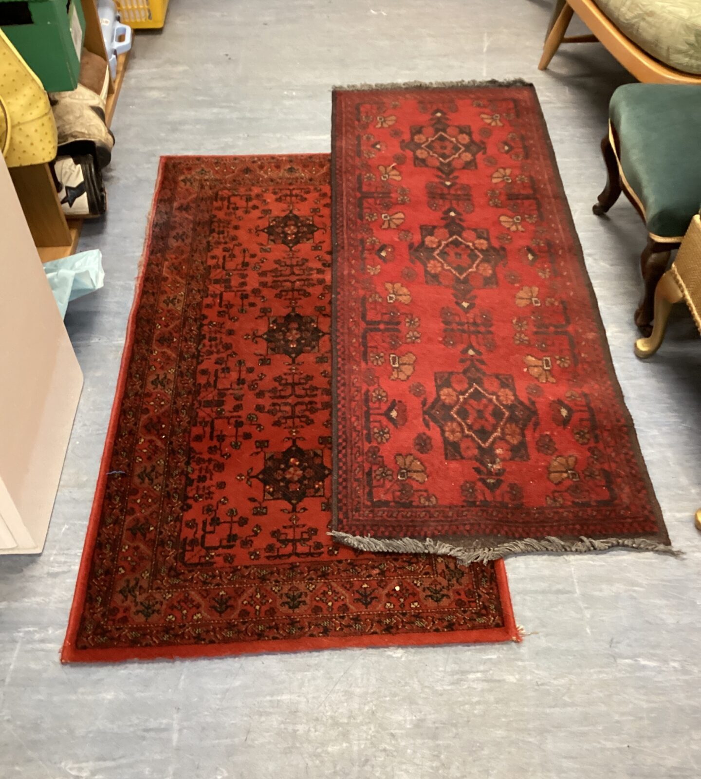 Two red runner rugs