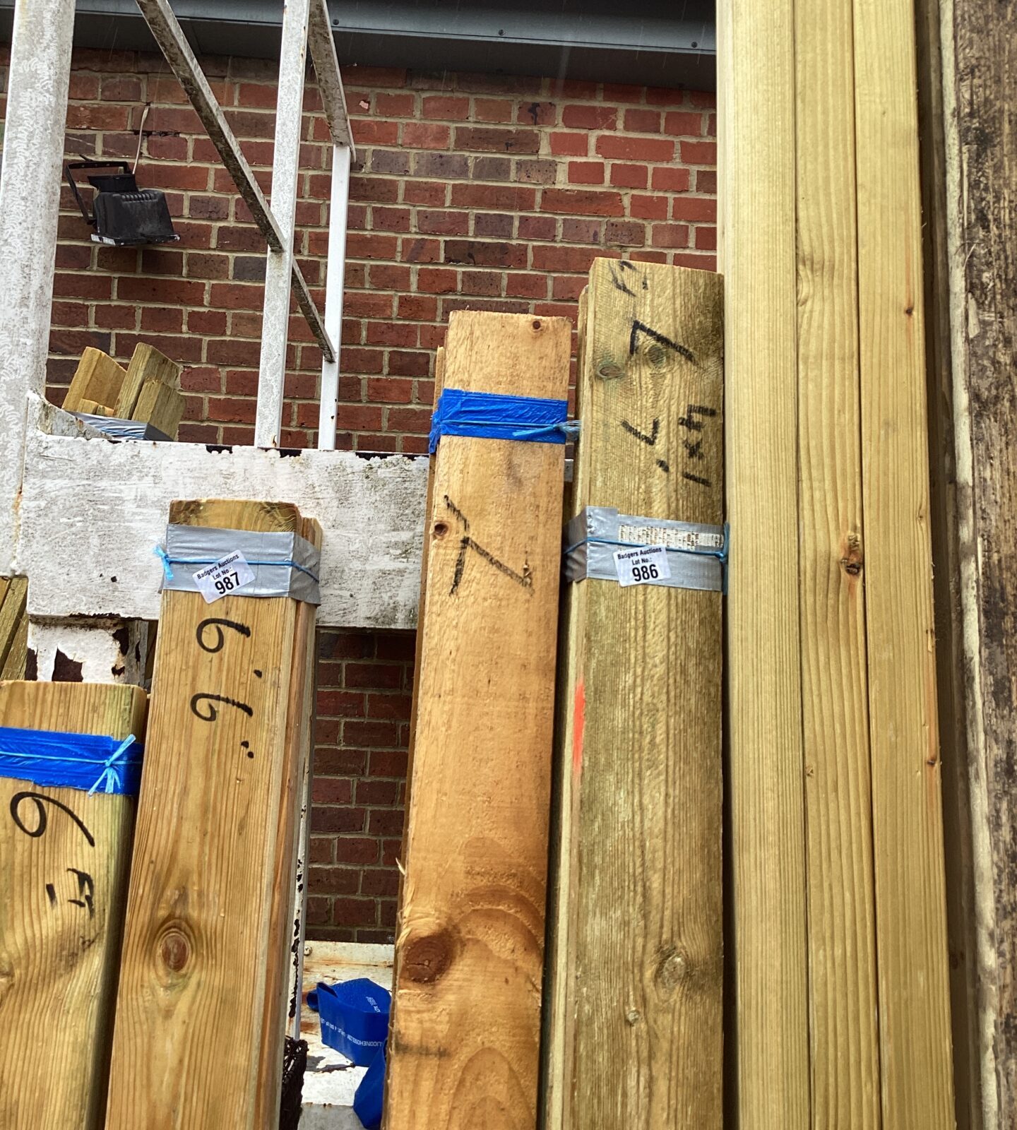 Three bundles of 7’ Timber
