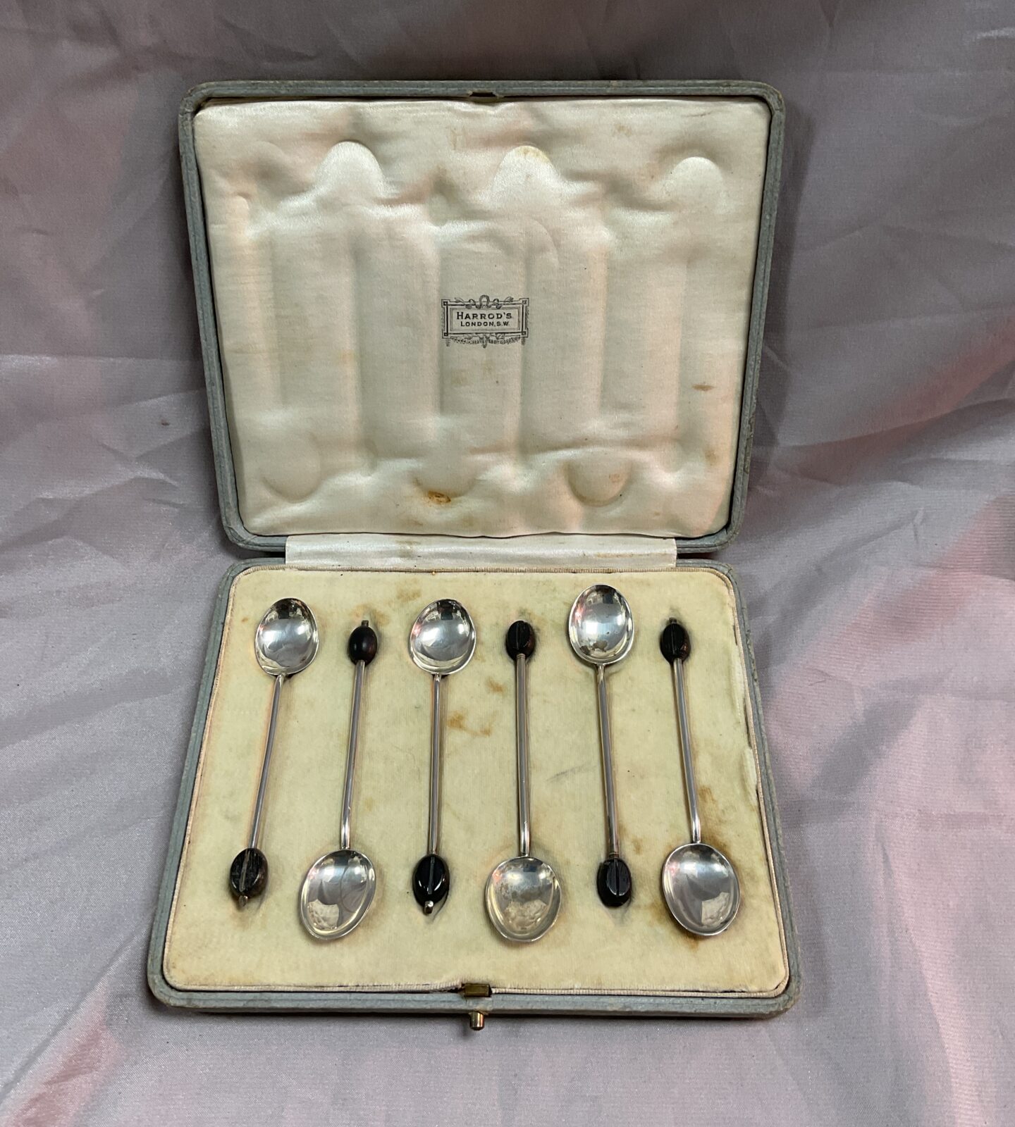 Set of hallmarked Sterling silver Harrods coffee bean spoons in case