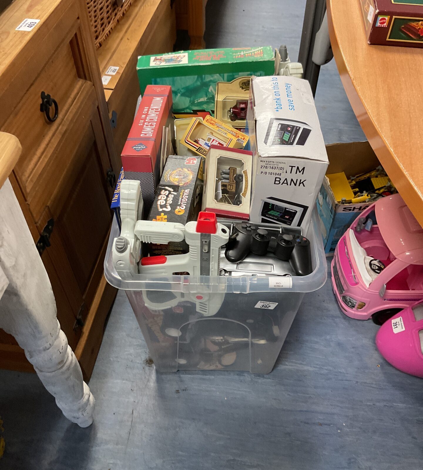 Large box of mixed toys inc boxed diecast models and board games