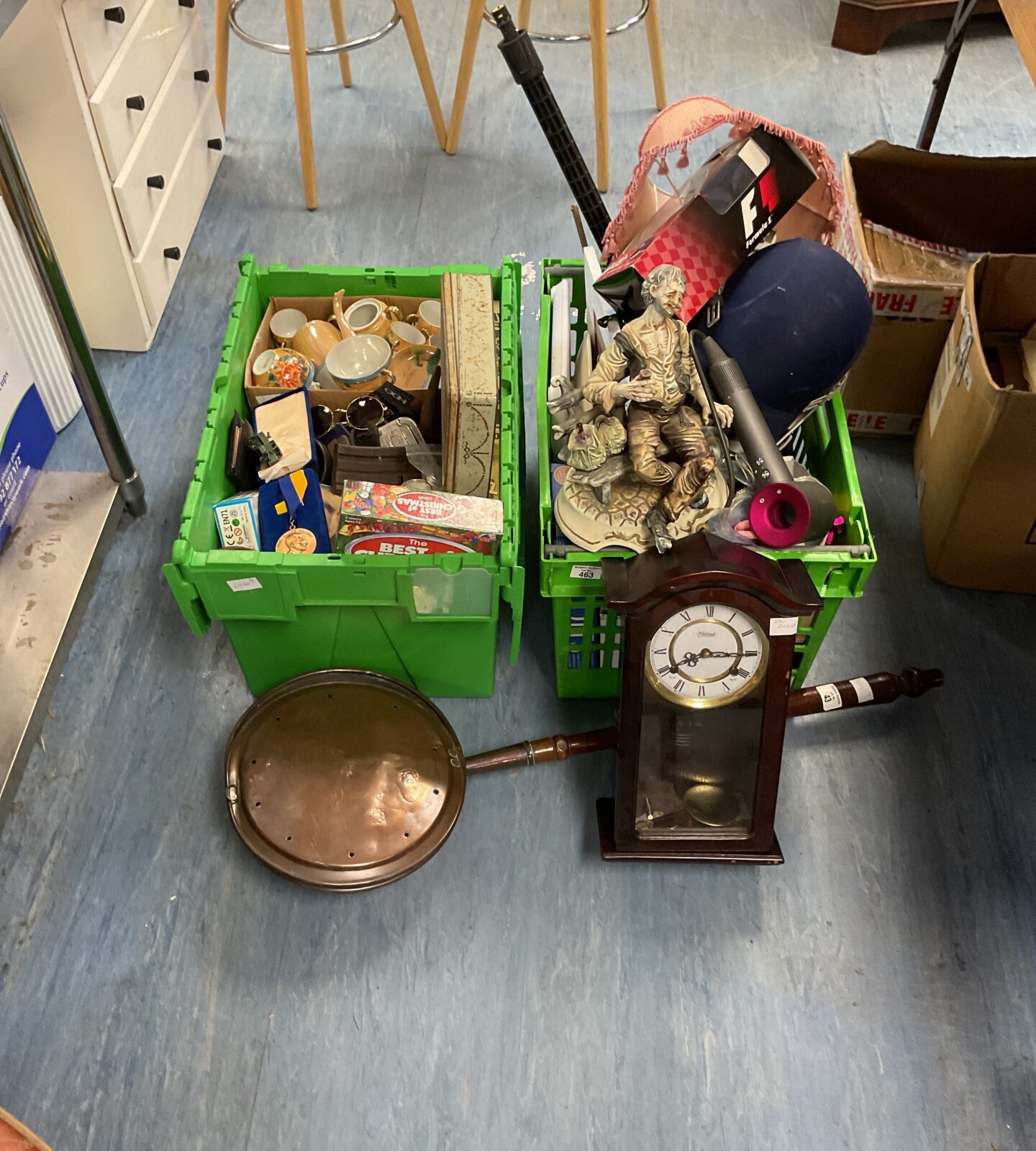 Two crates of mixed house clearance inc vintage bed pan, highlands clock, ceramics, china and vintage gun magazines