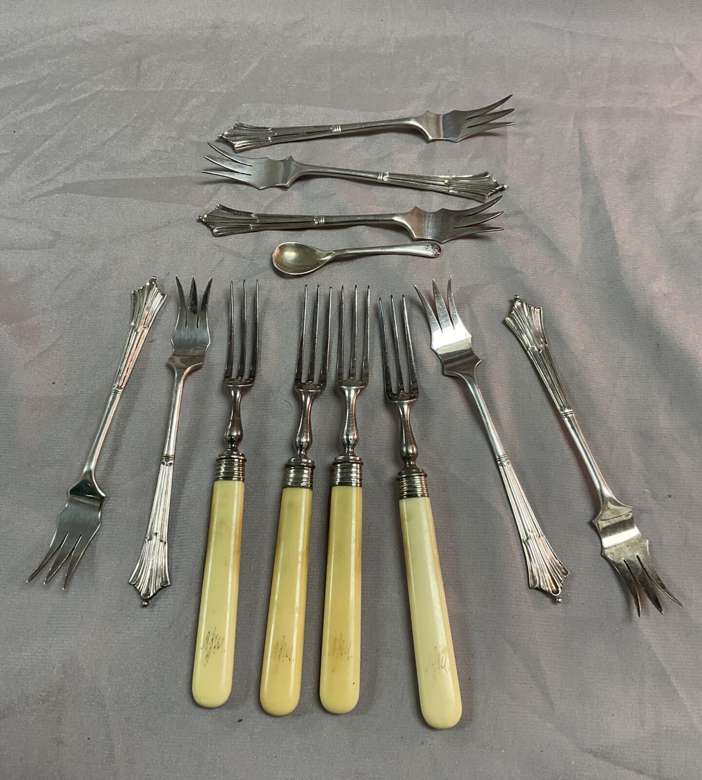 Seven vintage oyster forks four pickle forks and mustard spoon