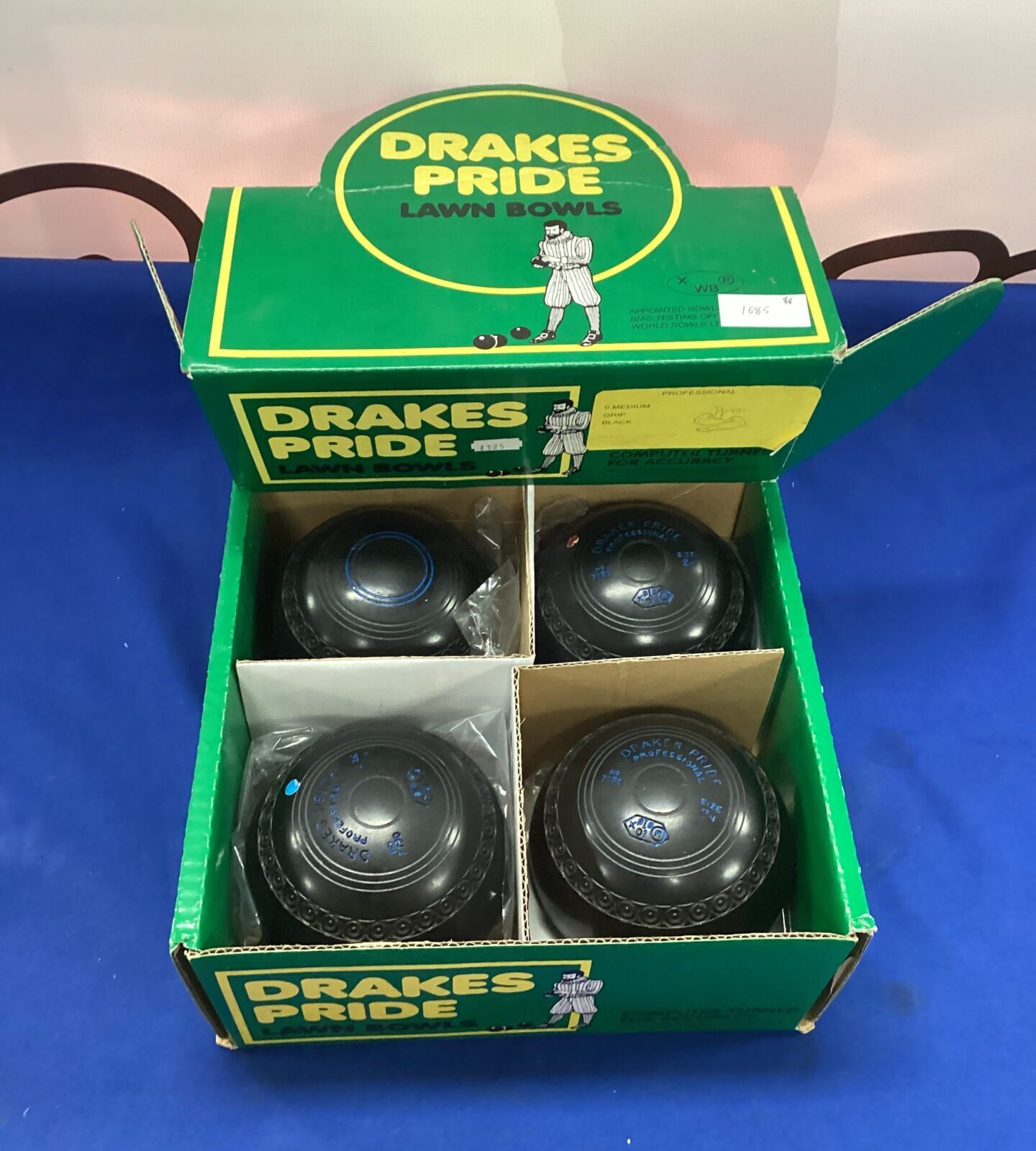 Box of four drakes pride lawn bowls