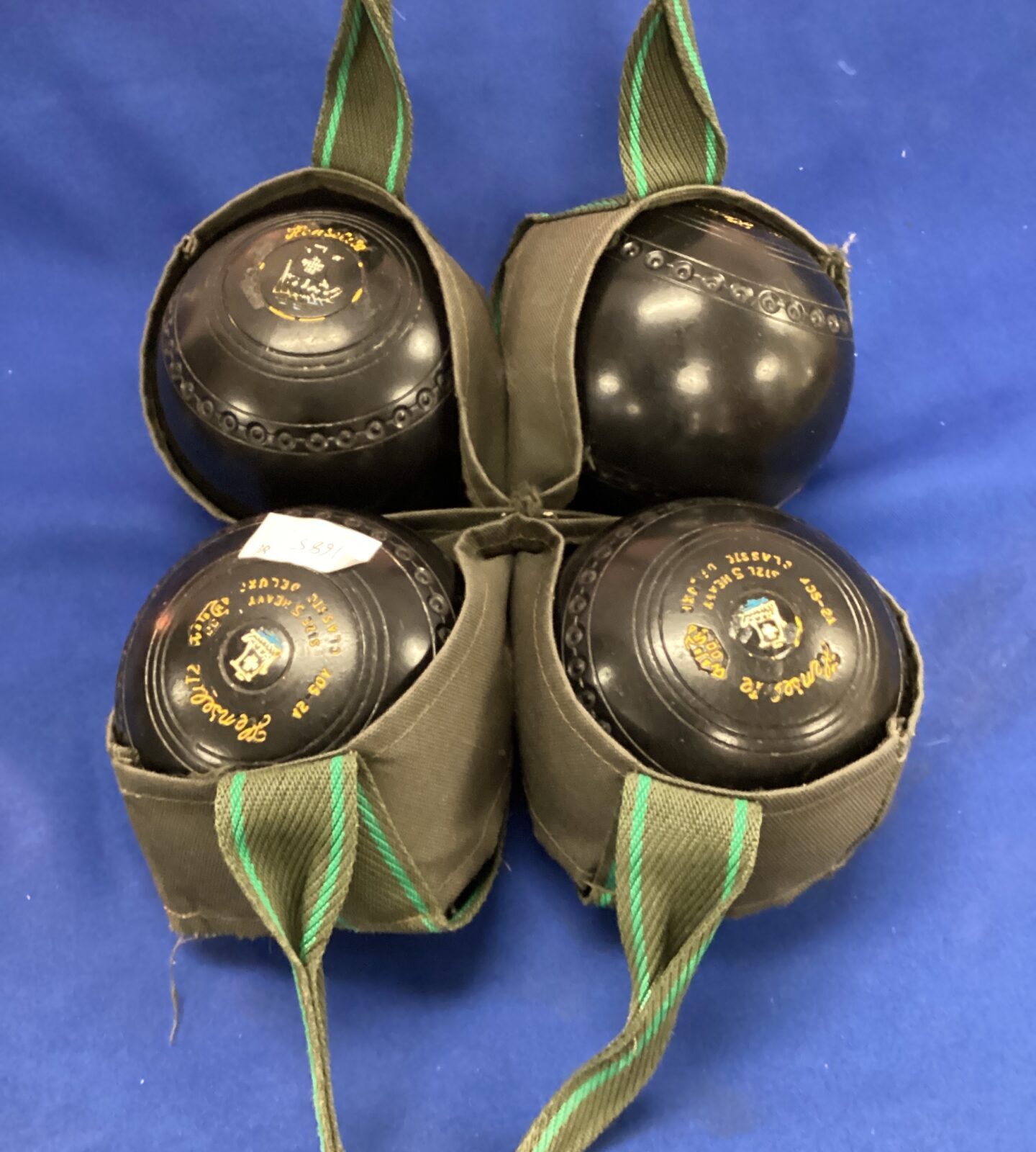 Set of four hemselite lawn bowls