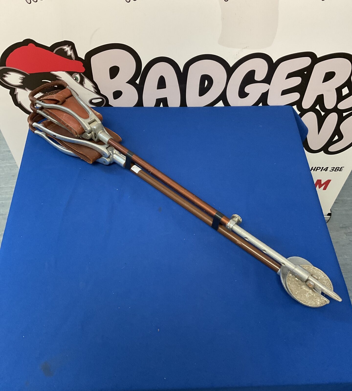 Two vintage leather seated shooting sticks