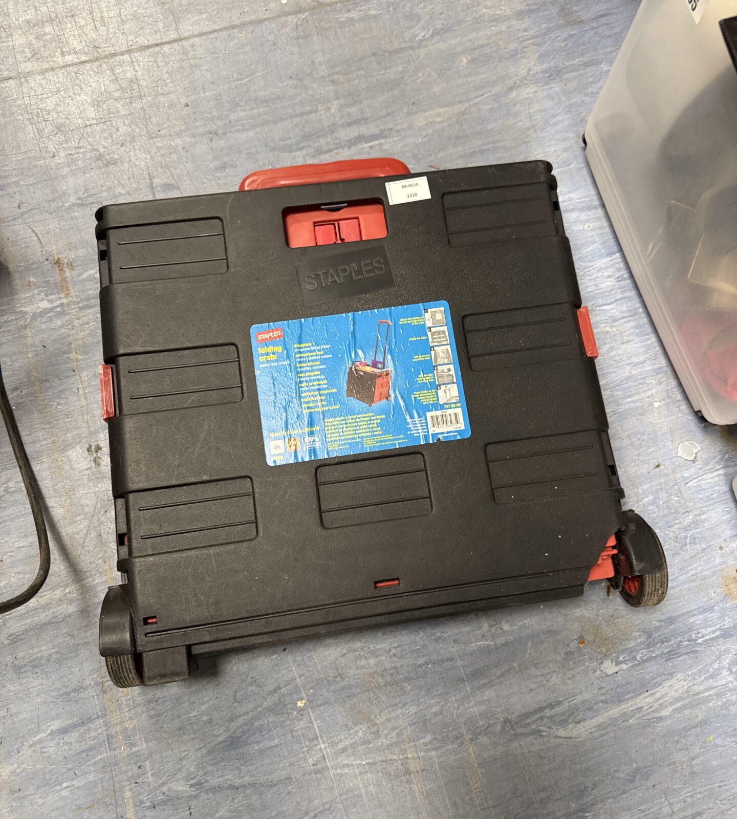 Staples folding wheeled crate