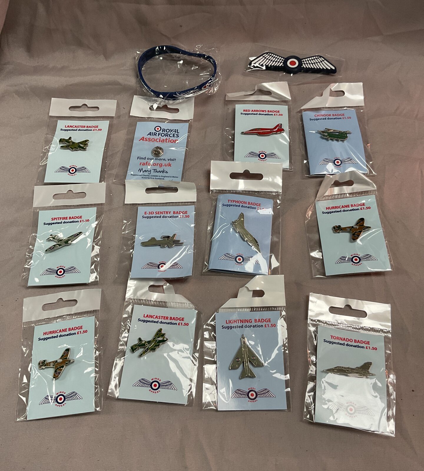 Collection of raf charity pin badges