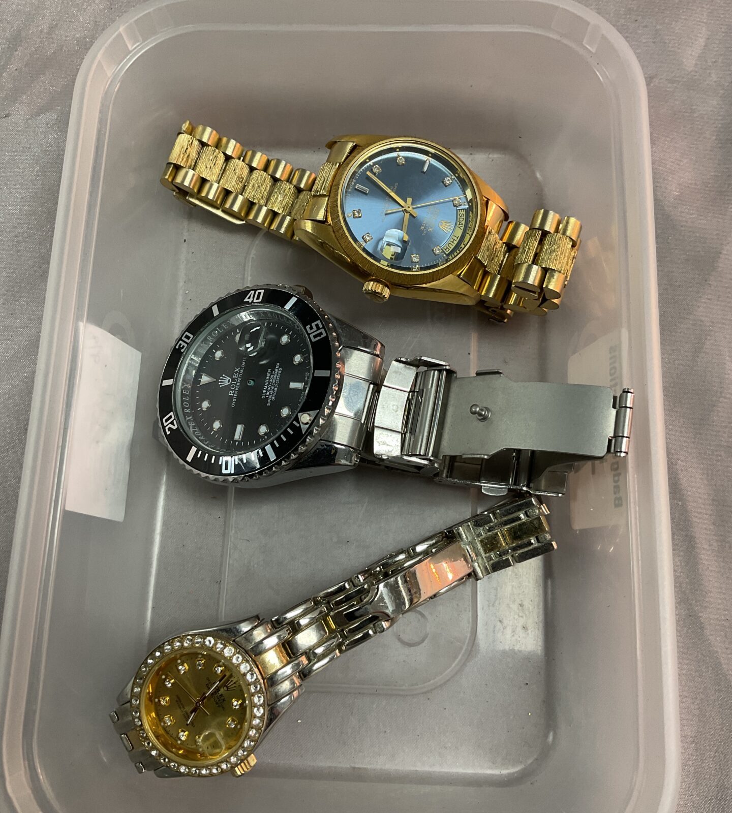 Three Wristwatches