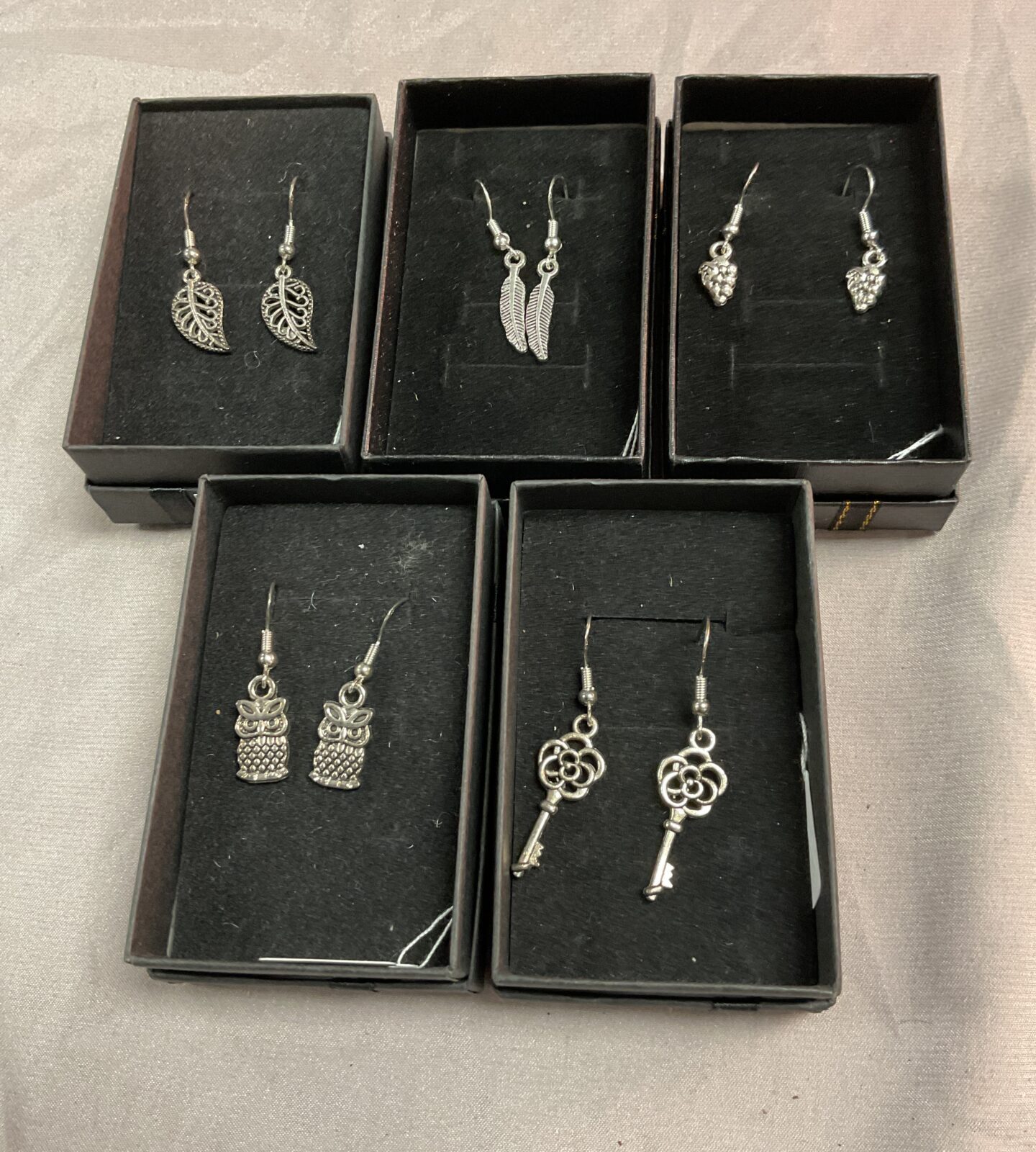 Five pairs silver earrings