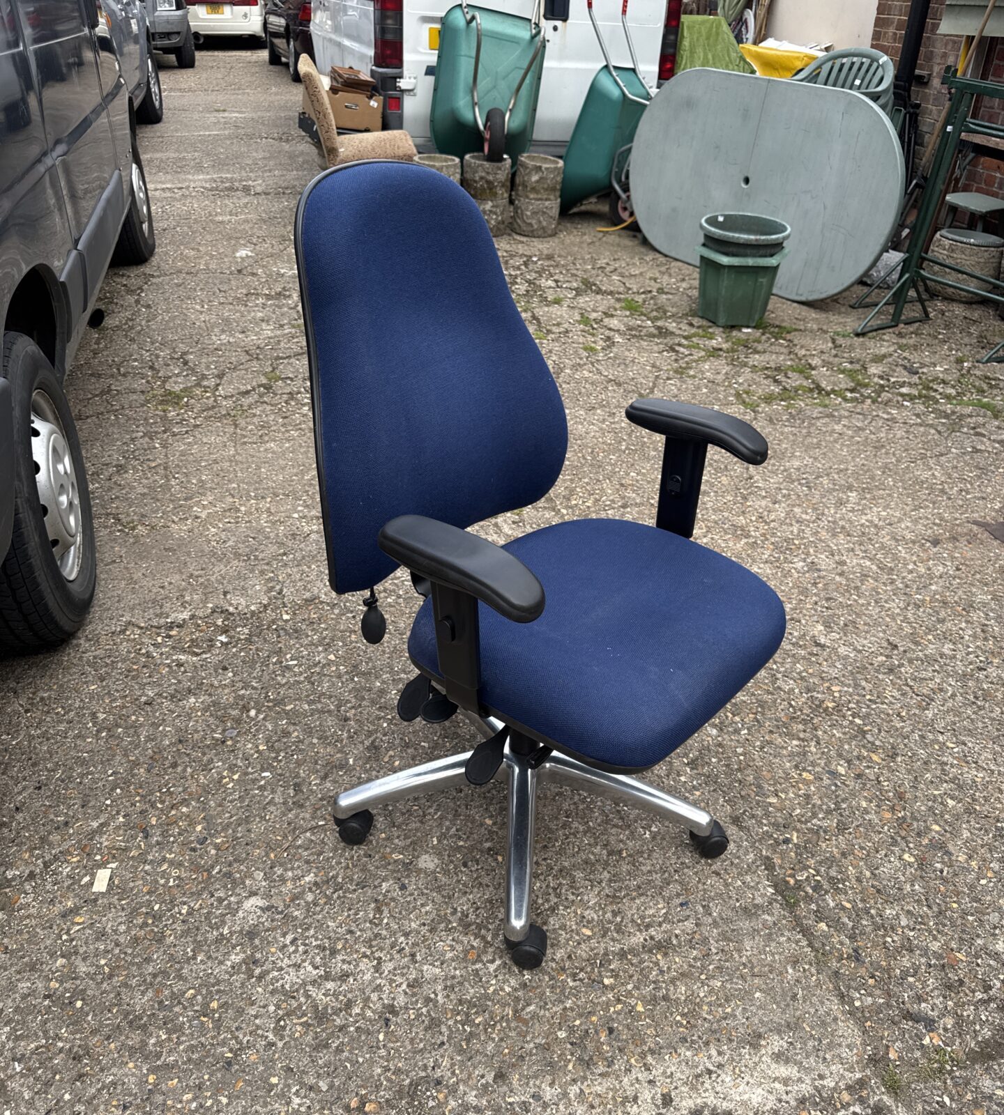 Reclining office chair with inflating back support