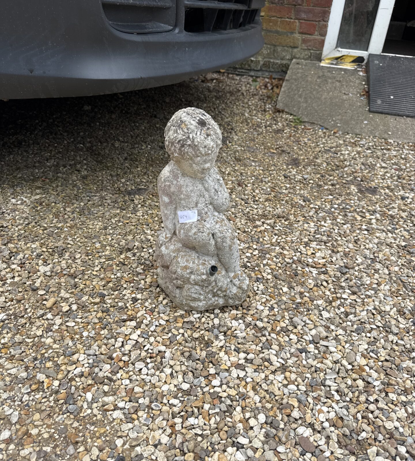 Small boy concrete garden ornament water feature 12” tall approx