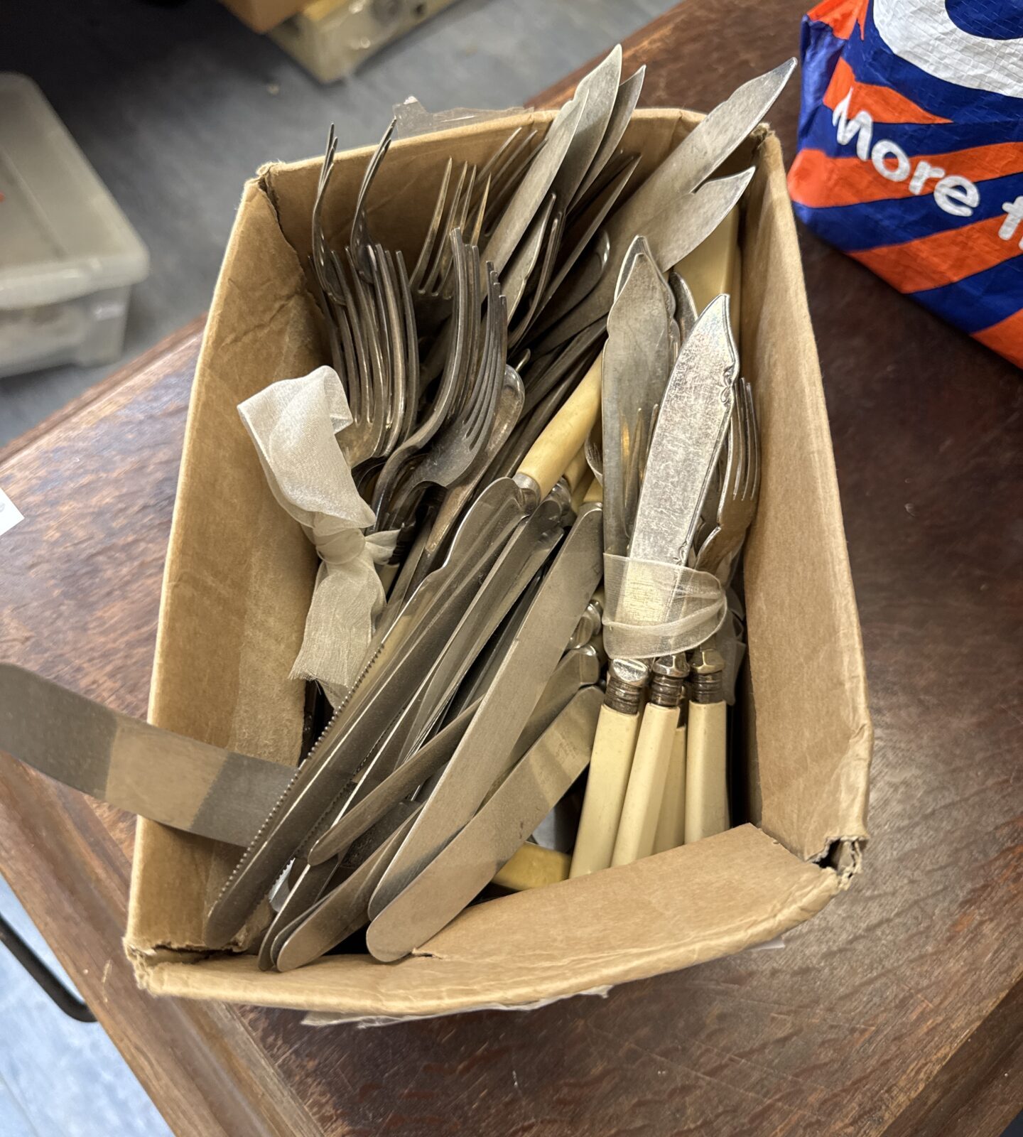Box of assorted vintage silver plated cutlery