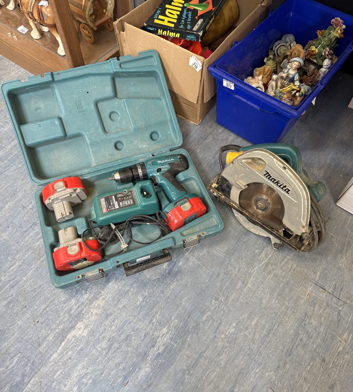 Makita cordless drill with charger & batteries (spares/repairs - drill bit clamp broken) with 110v circular saw (untested)