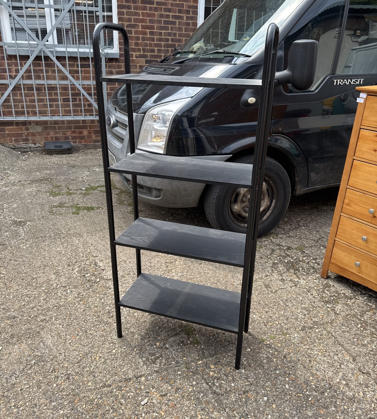 Four tier shelving unit with wooden shelves 58” tall x 25.5” width x 11” depth