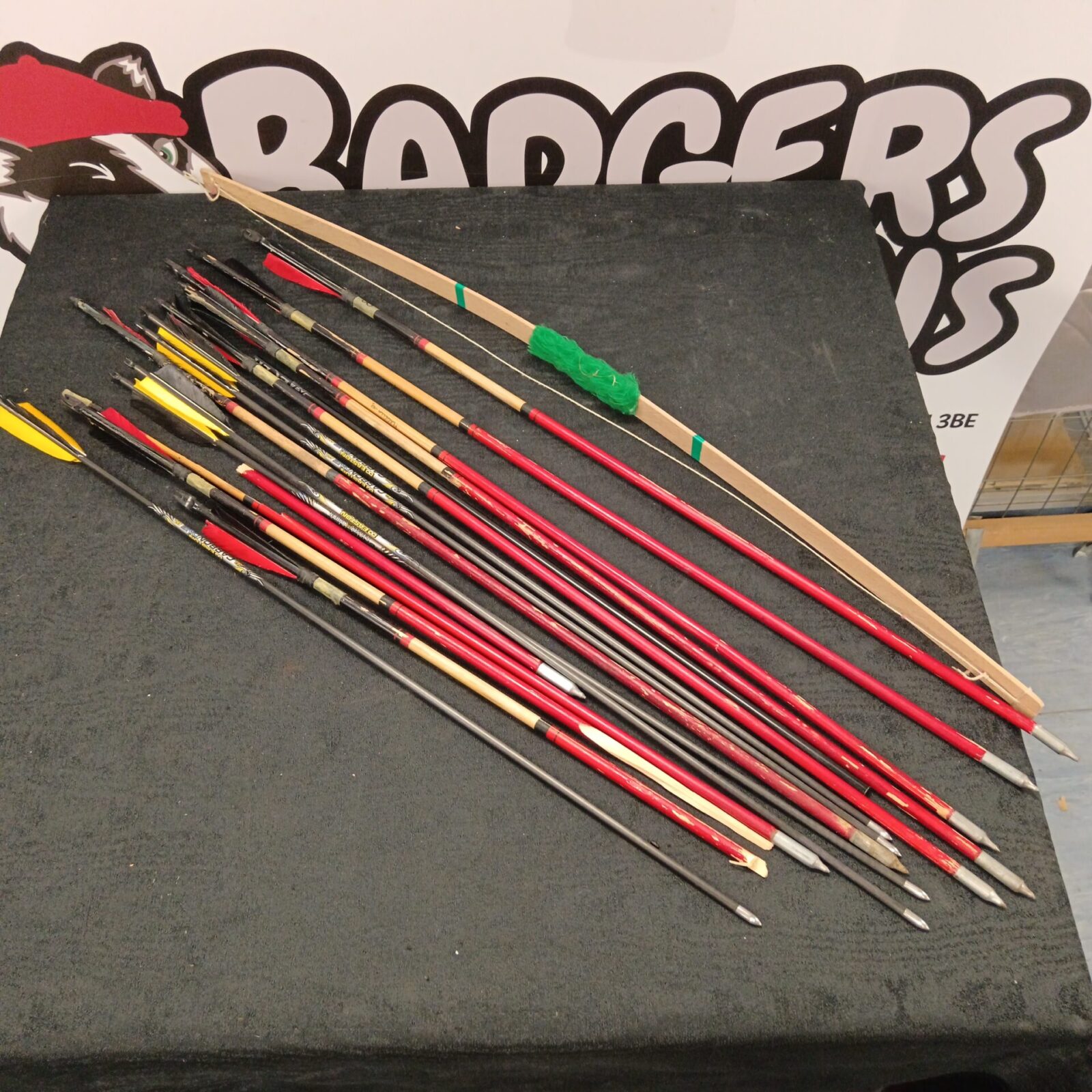 Bundle of arrows & child's wooden bow