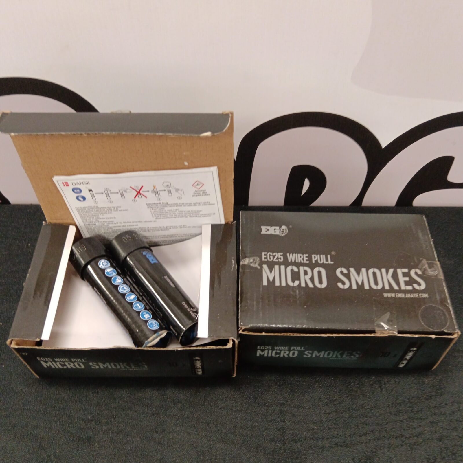 Two boxes of eg25 wire pull micro smokes paintball smoke bombs