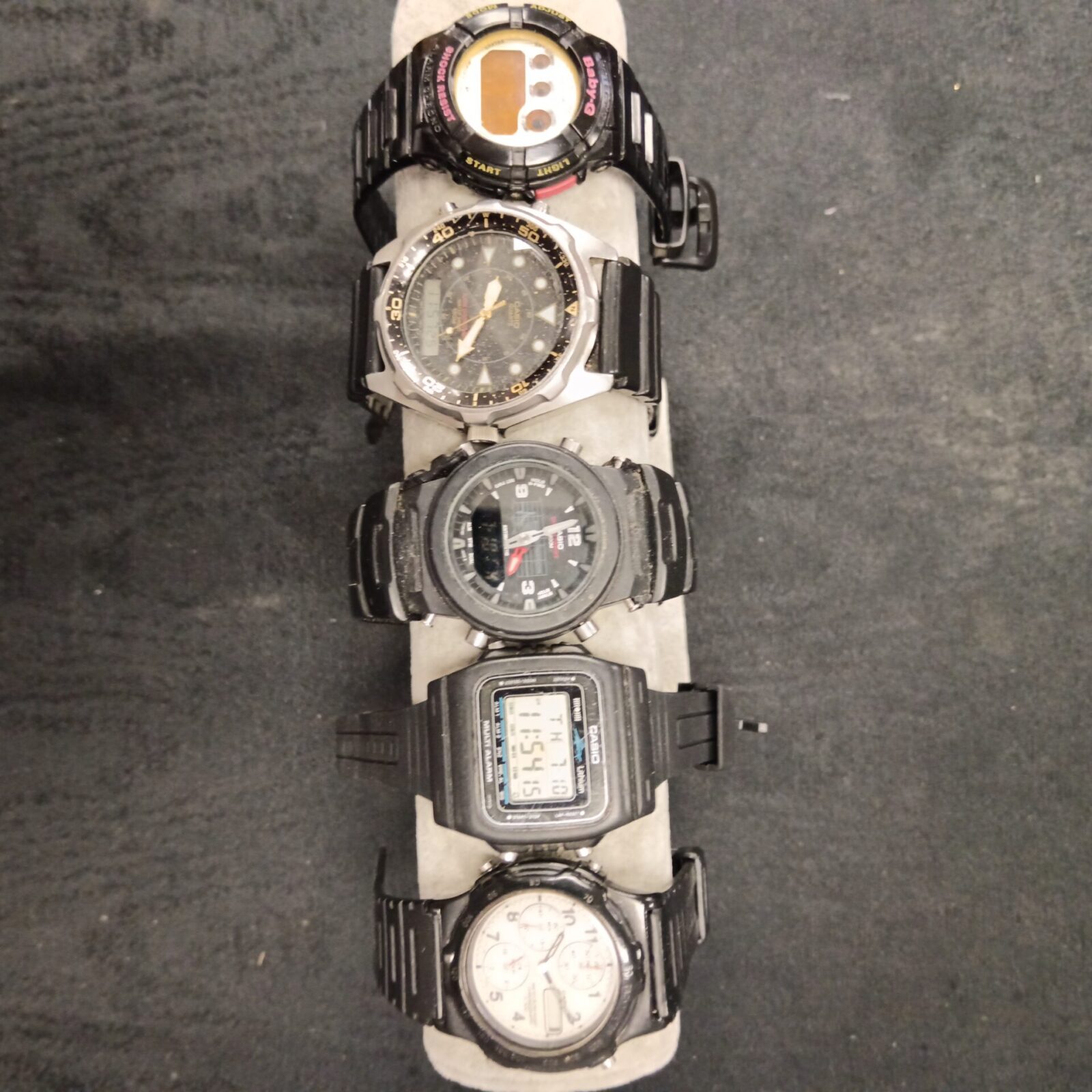 Five gents watches including Casio gshock