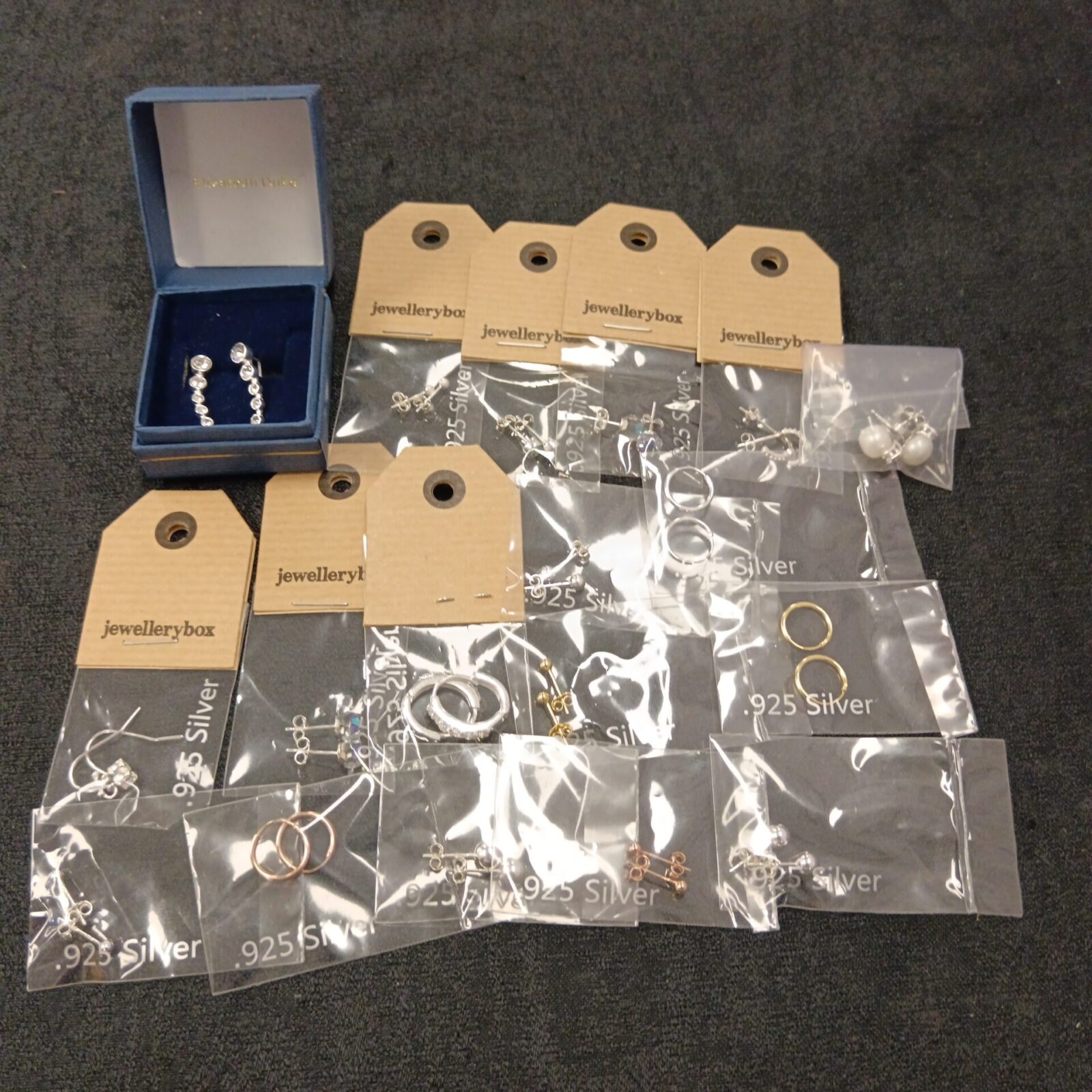 18 pairs of 925 silver earrings