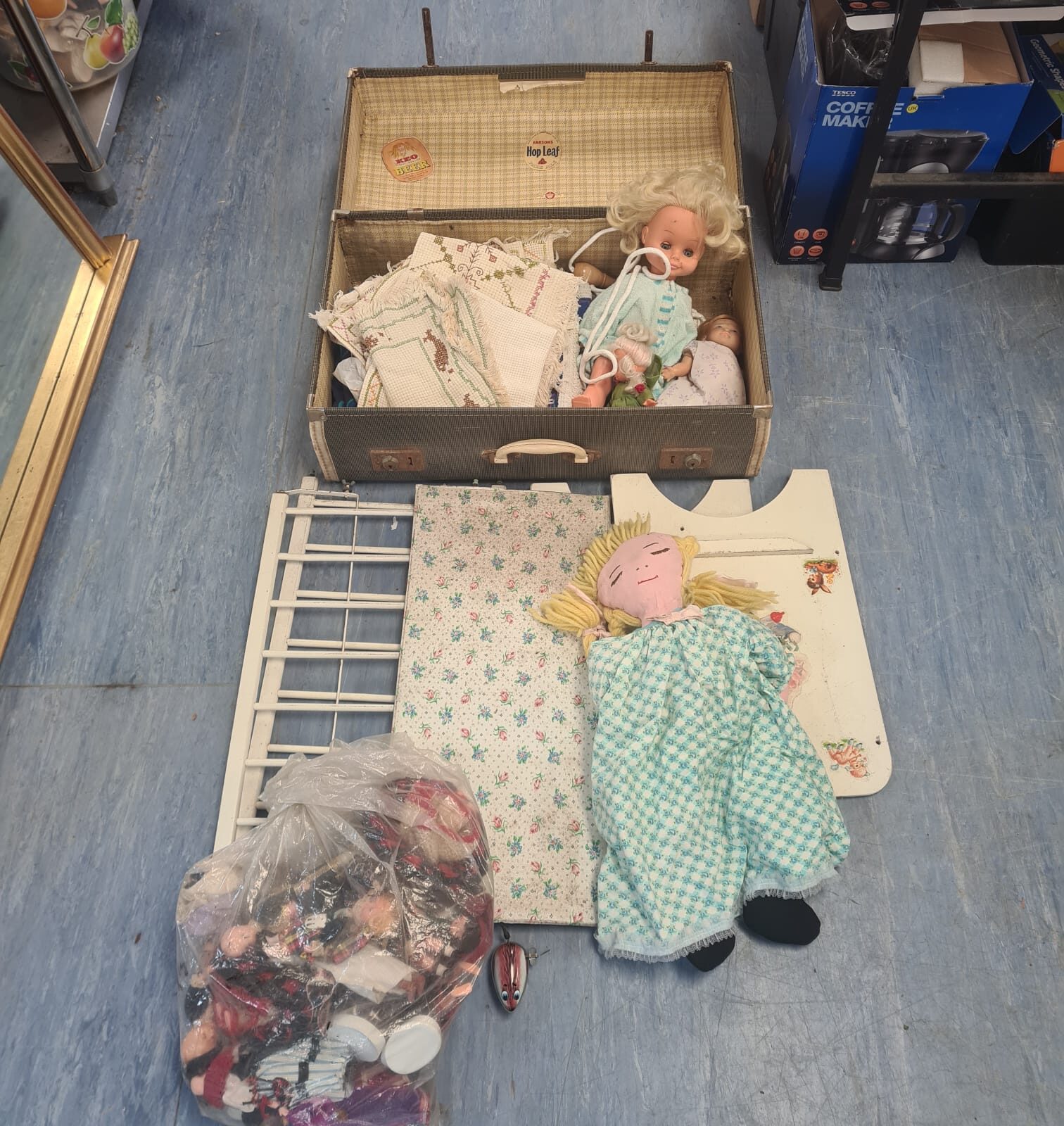 Vintage case with 1960s dolls, linnen and clockwork mouse toy