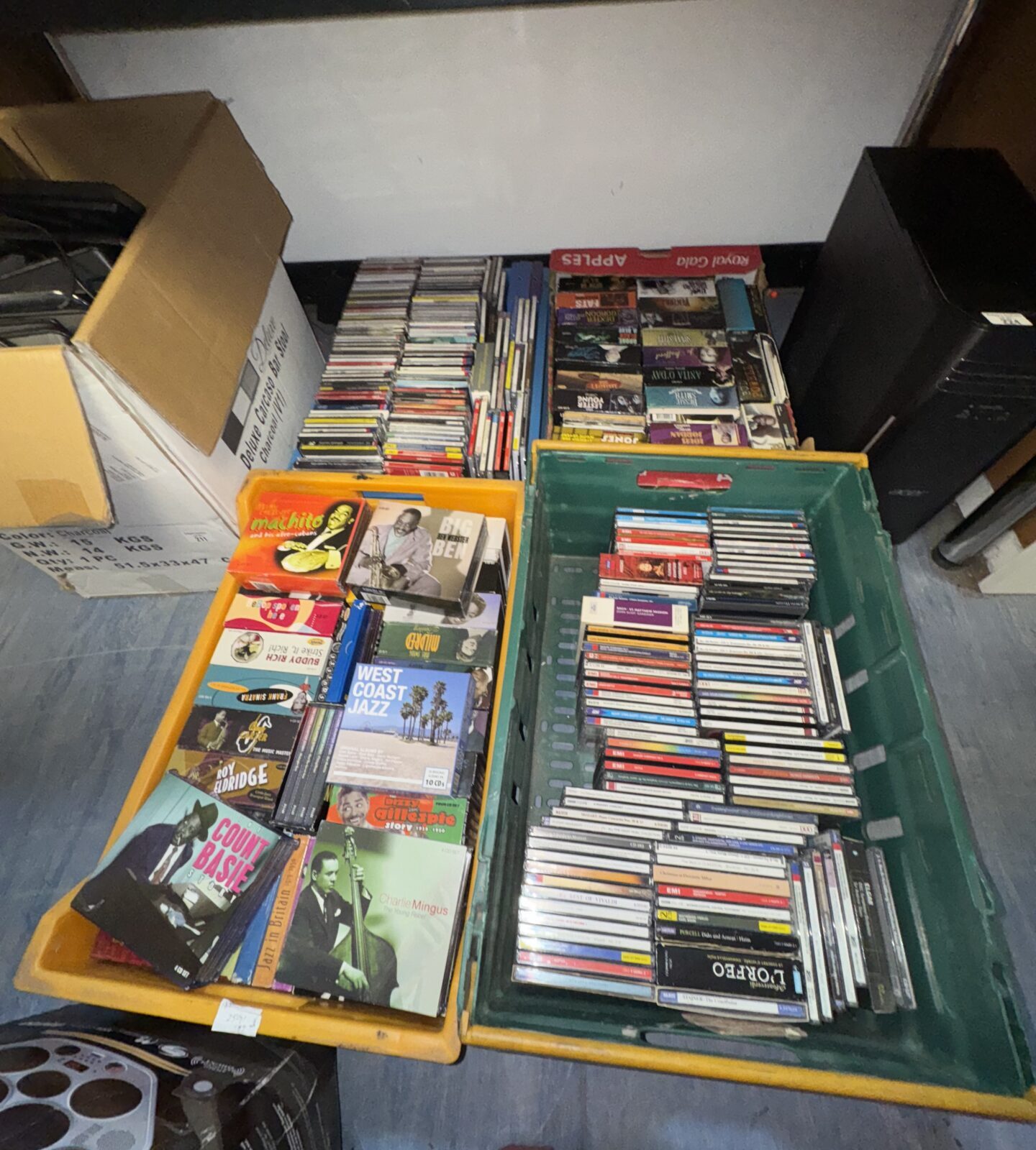 4 large boxes of assorted CDs