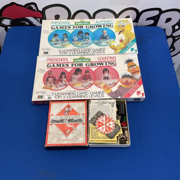 Mixed board games inc two sealed sesame street card games and monopoly