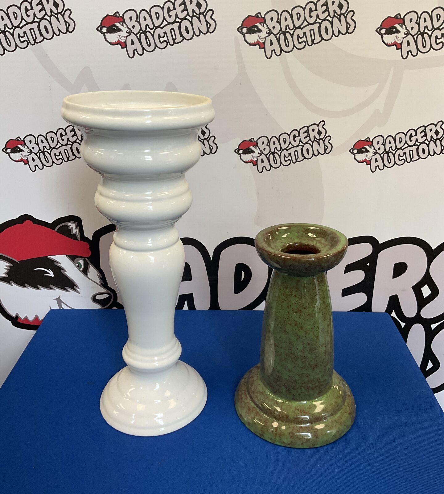 Two ceramic jardiniere pot stands