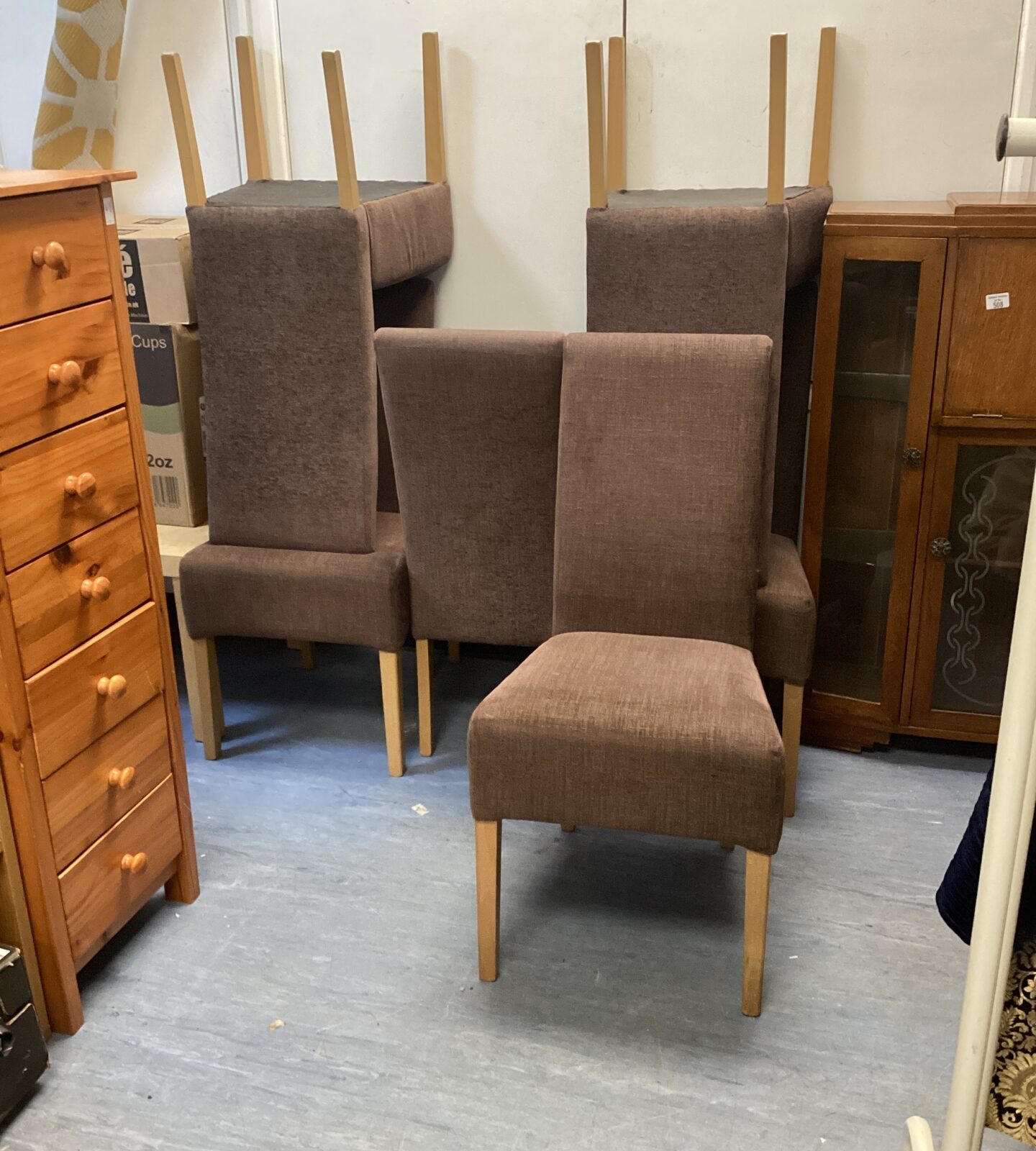 Six brown dining chairs