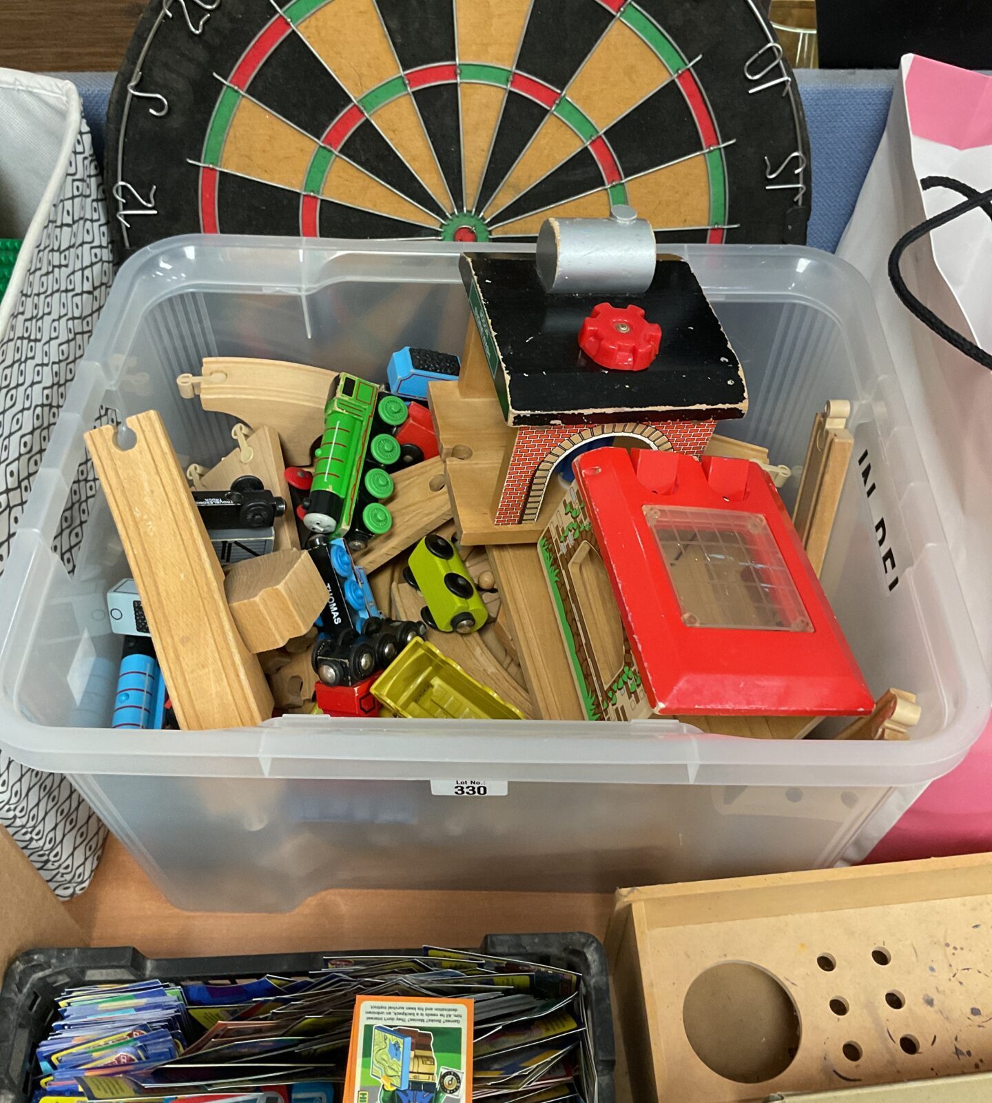 Box of wooden toy blocks and trains