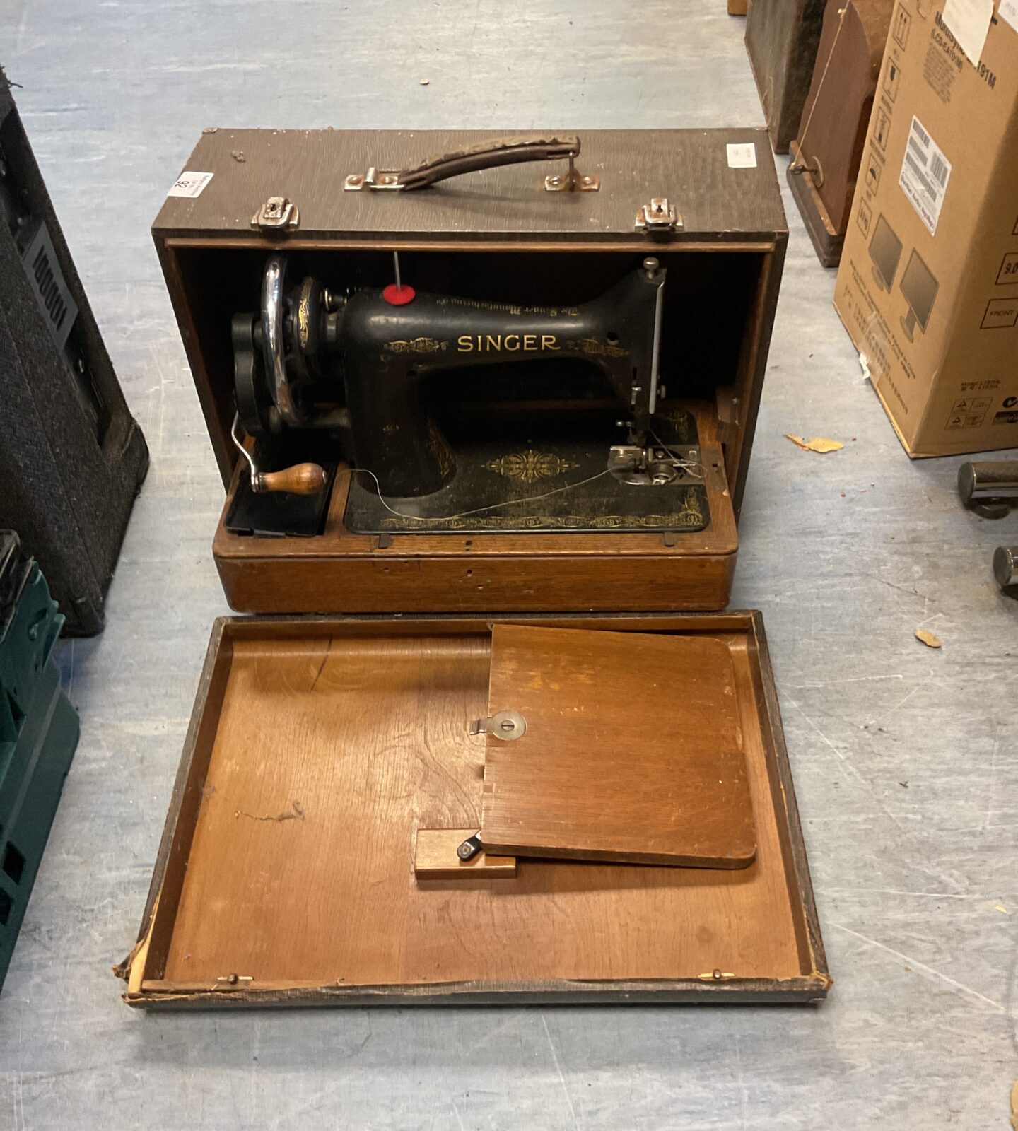 Vintage hand cranked singer sewing machine