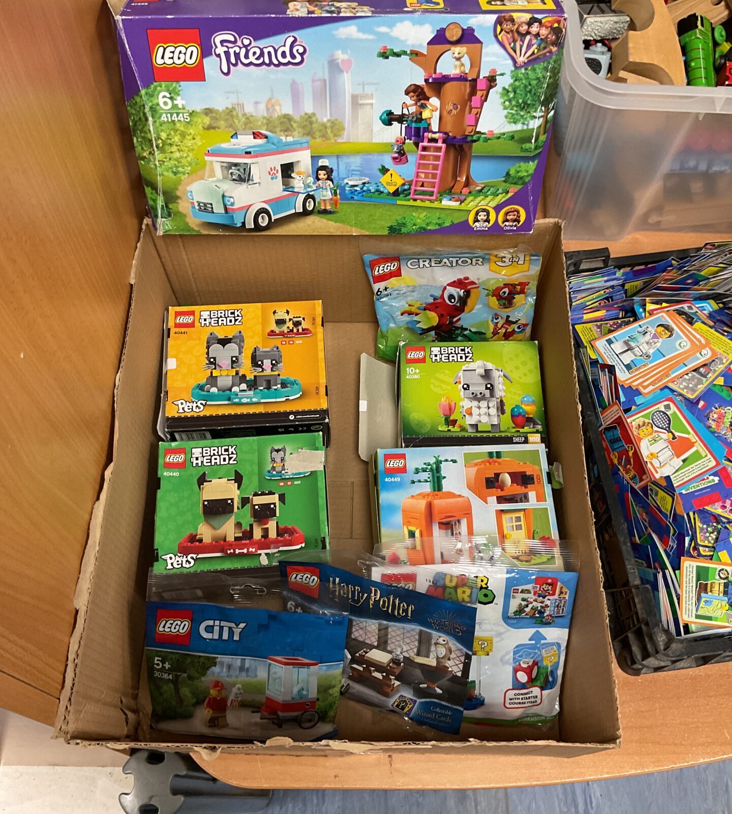 Box of mixed lego sets inc new polybags, brick heads and lego friends