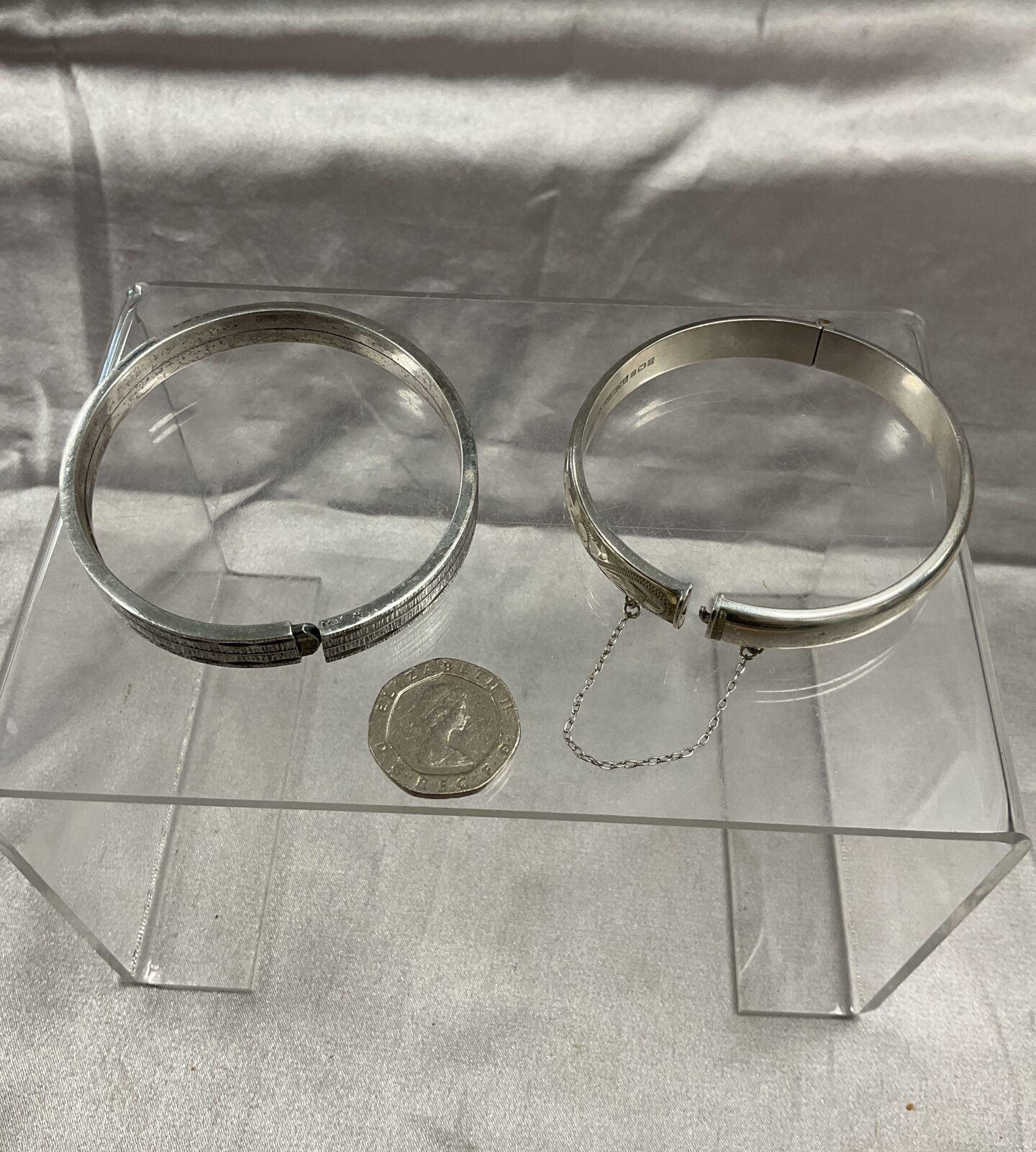 two silver bangles