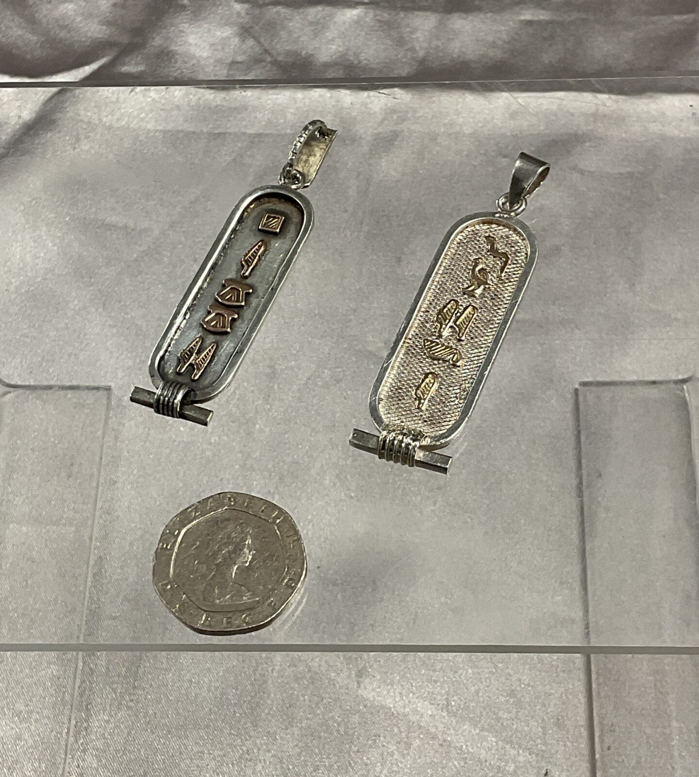 Two silver Egyptian ingot pendants 11.95g