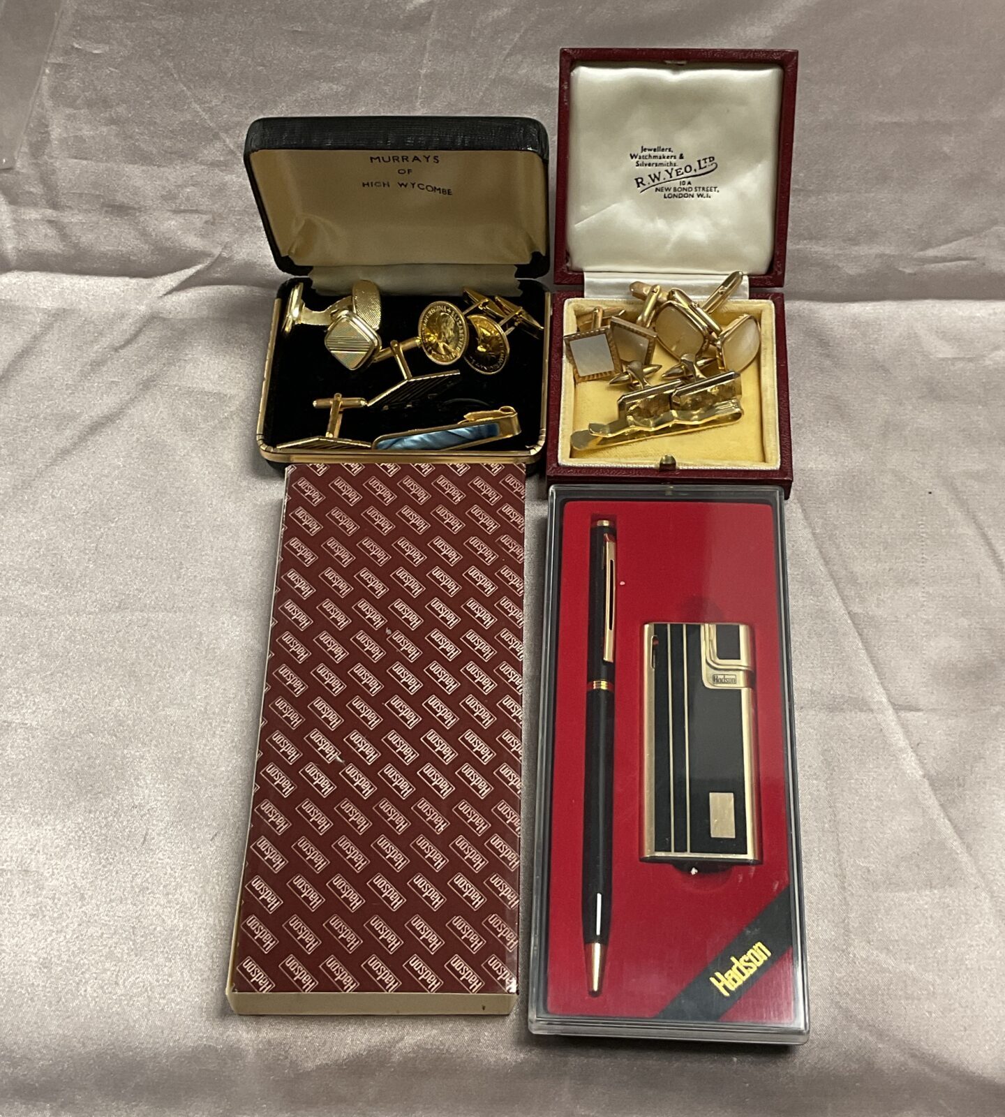 Two boxes cufflinks and hadson pen and lighter set