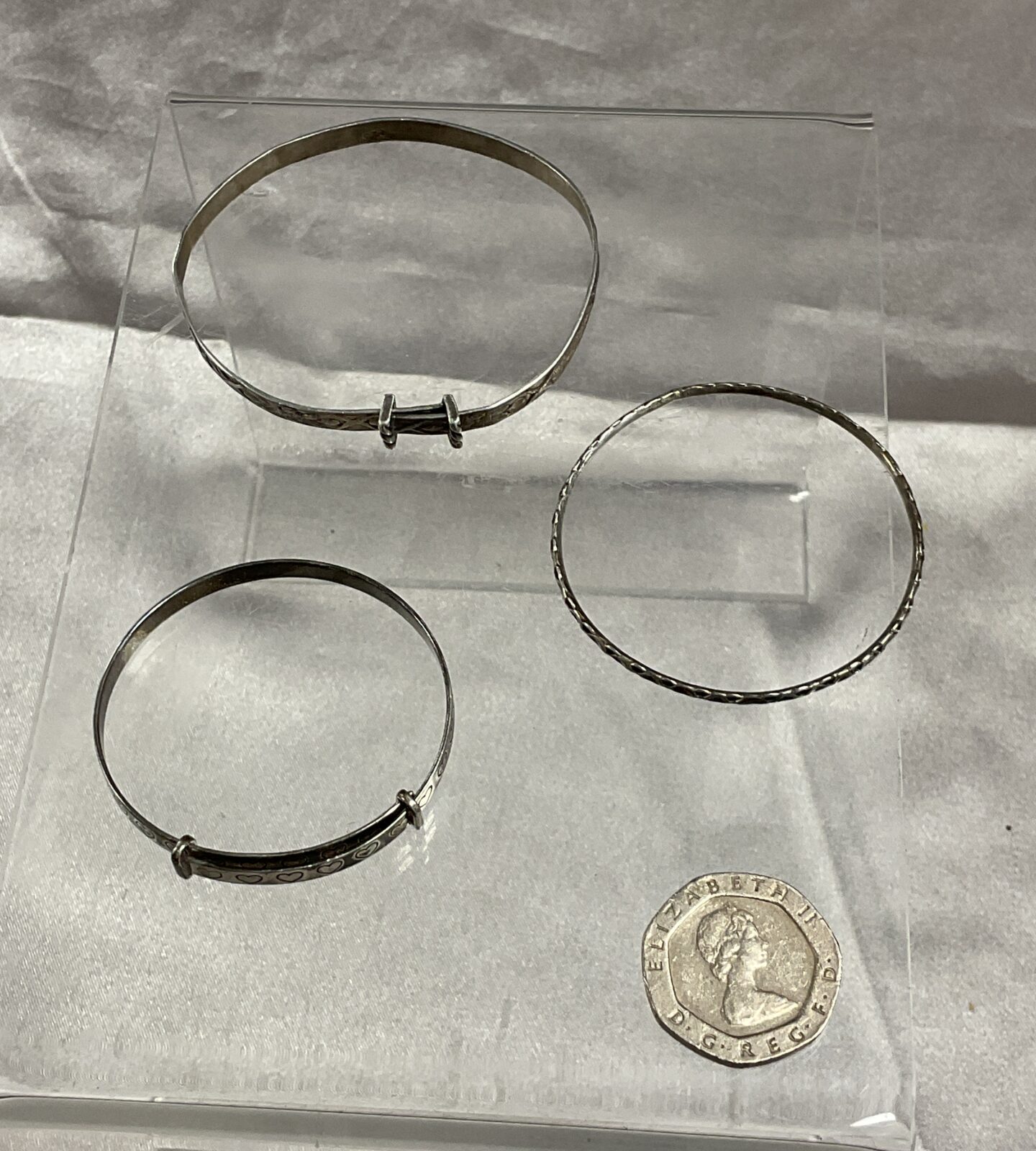 Three christening bracelets inc silver