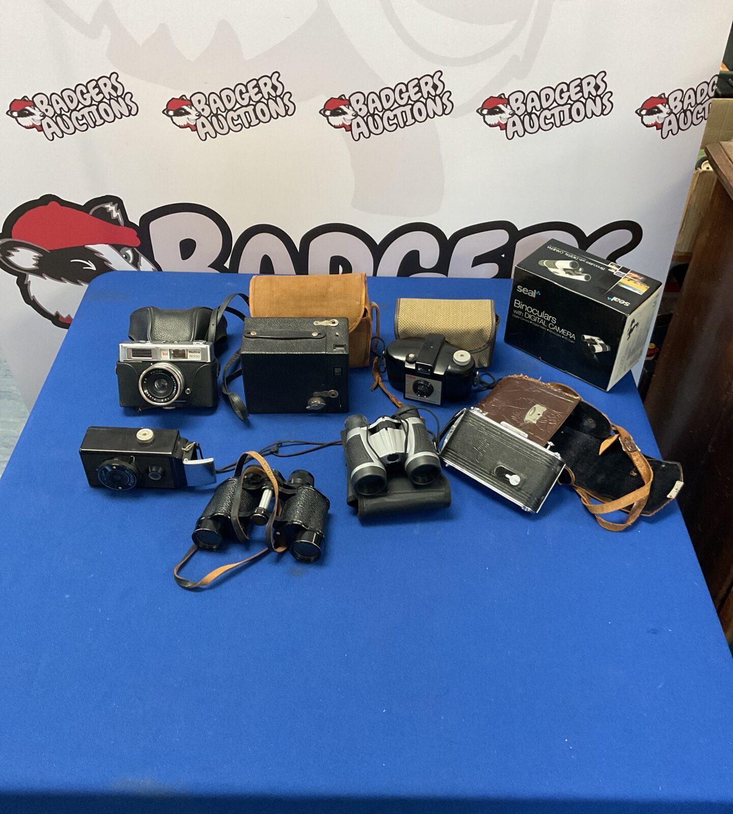 Lot of vintage cameras and binoculars, incl. monarch, kodak, and seal binoculars with digital camera