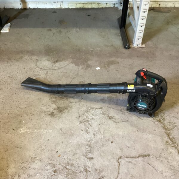 Makita petrol leaf blower for garden cleaning and debris removal.