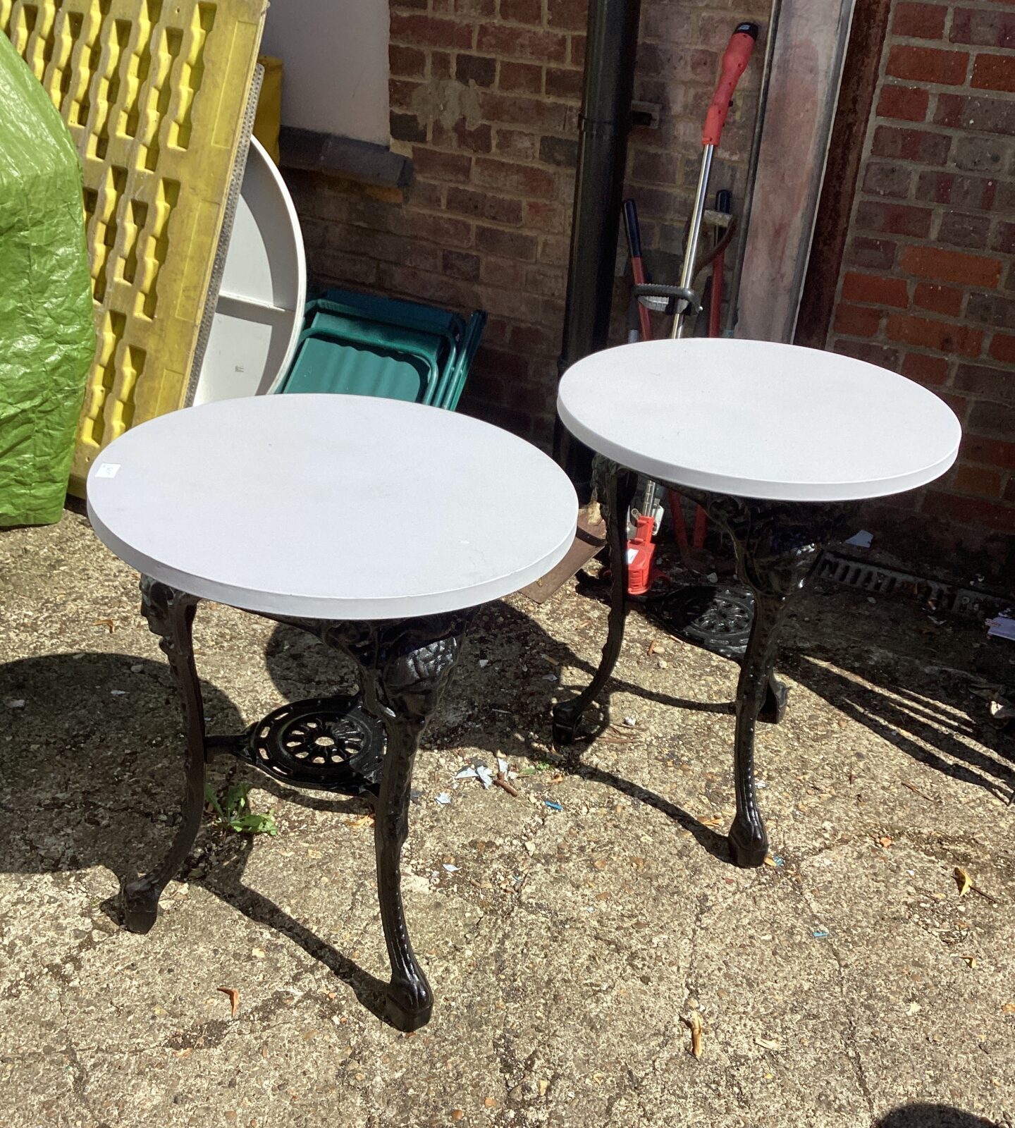 Two Refurbished wrought iron based Garden Tables