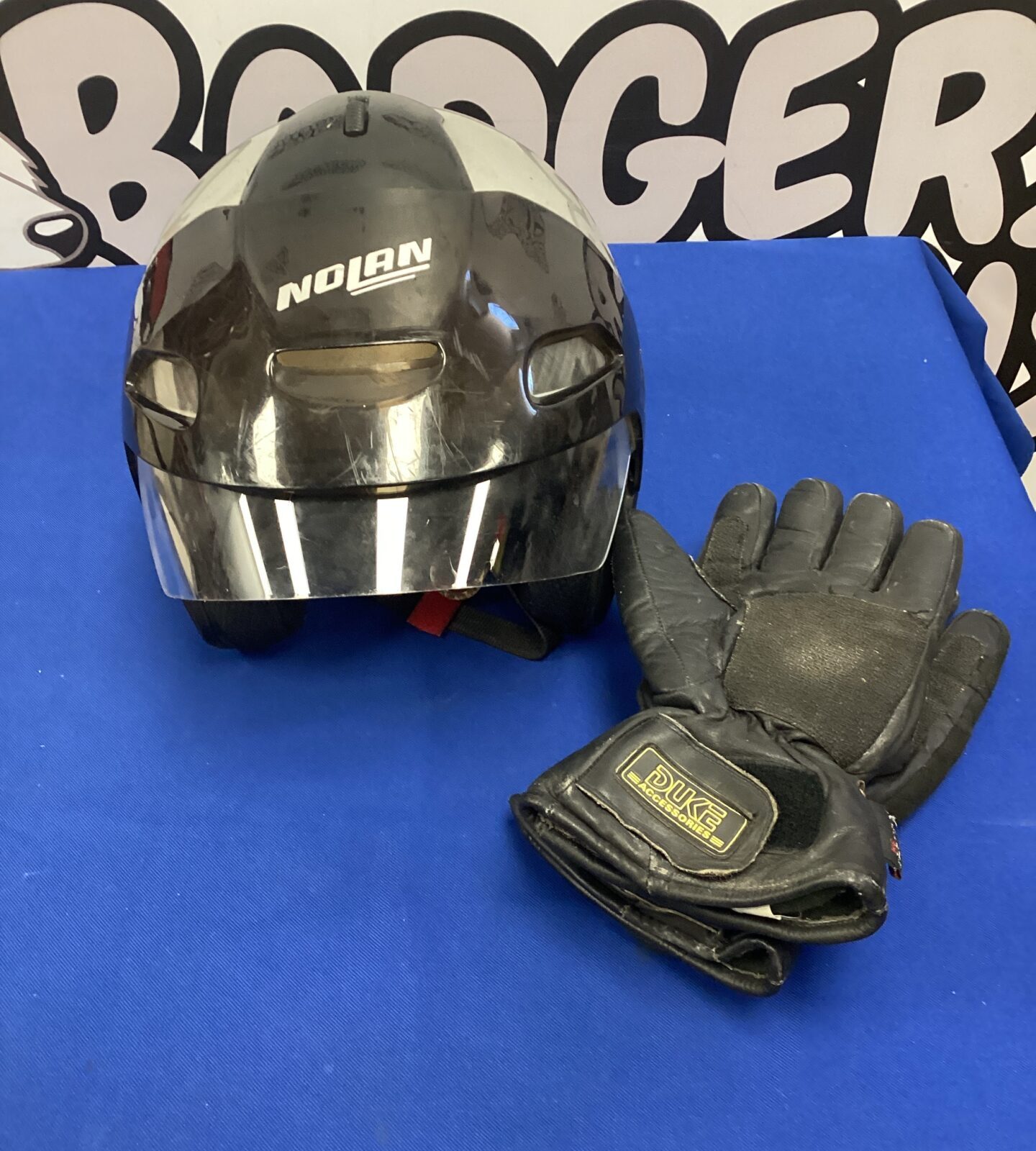 Type A nolan motorcycle crash helmet & pair of duke accessories
