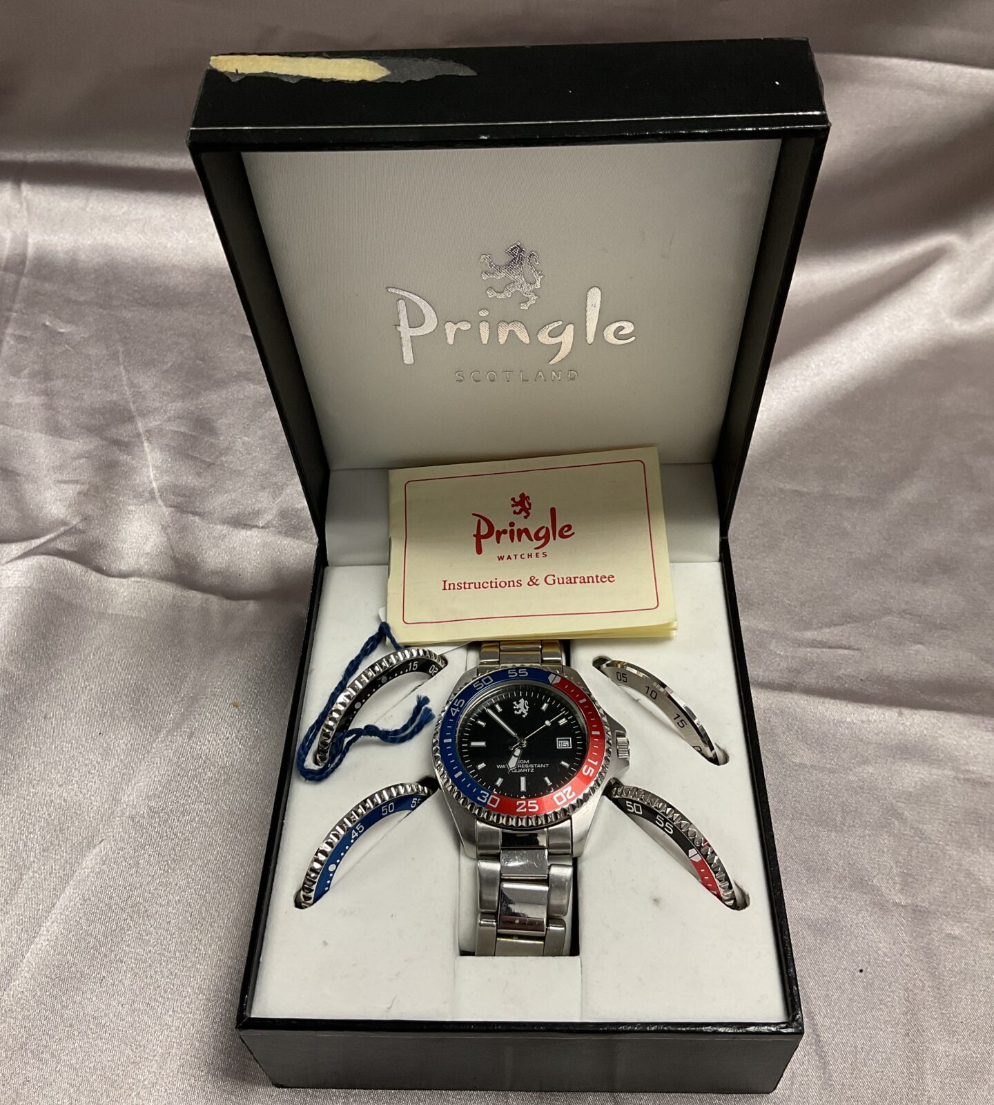 Pringle Scotland Quartz wristwatch with interchangeable bezels in box