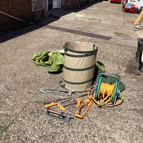 Quantity of garden watering sprinklers, hose and leaf bags